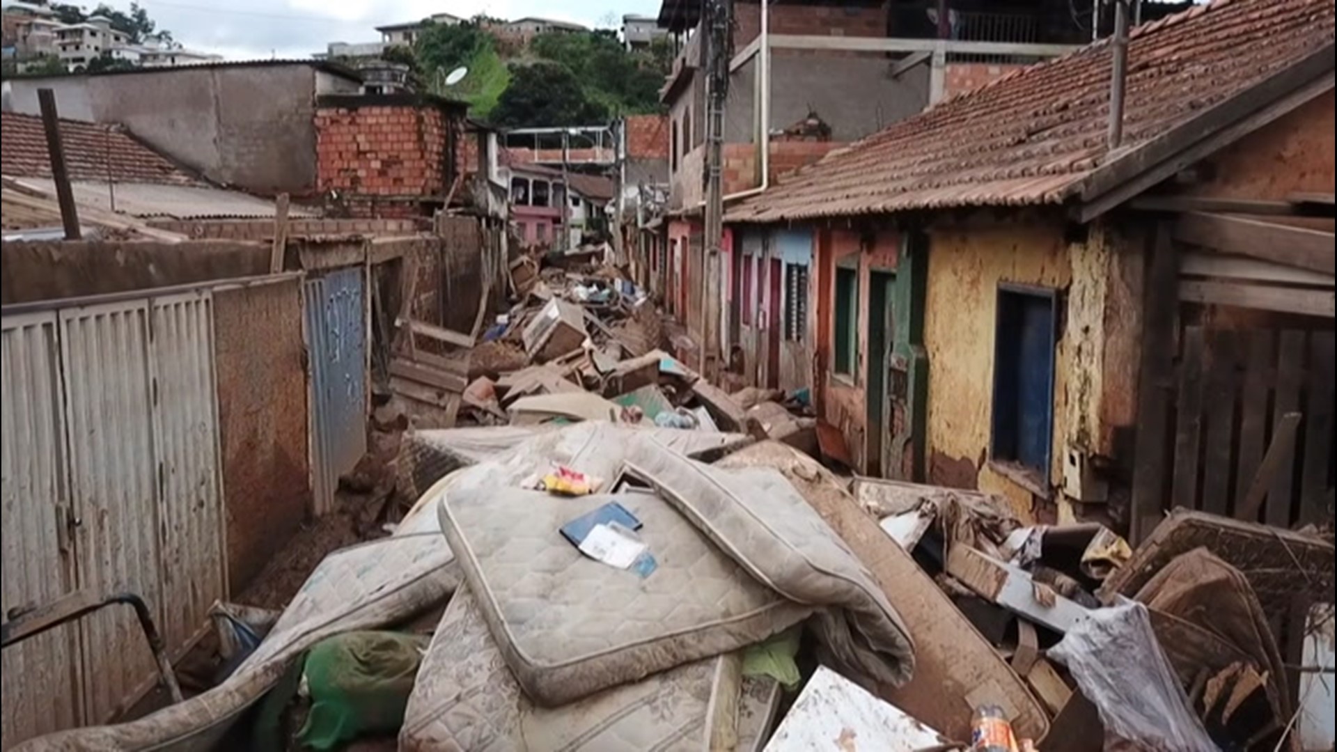 The streets of Raposos, Minas Gerais, Brazil, were coated in mud and debris on Jan. 28 after the worst floods the area has endured since records have been kept swept through the area.