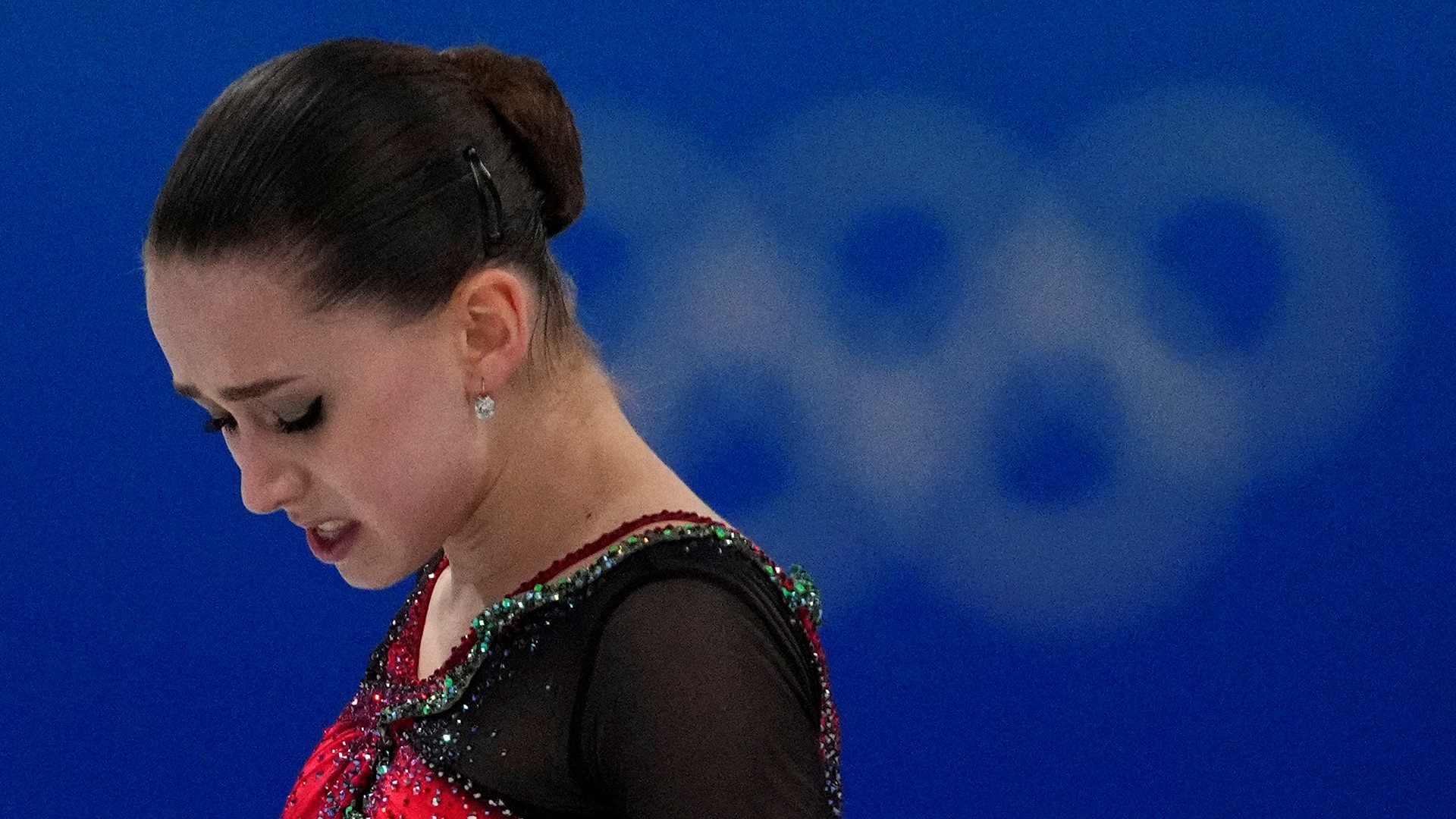 The Beijing Olympics women's figure skating competition ended in emotional chaos while an American-born action-sports star made history.