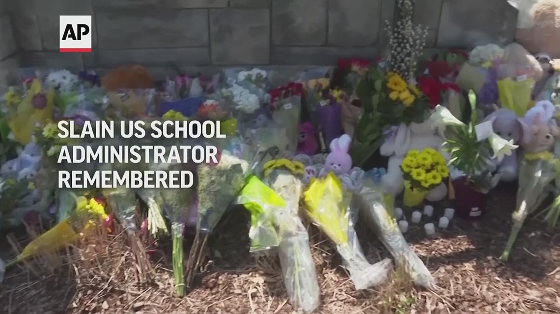 Friends remember slain school administrator as 'natural born leader'