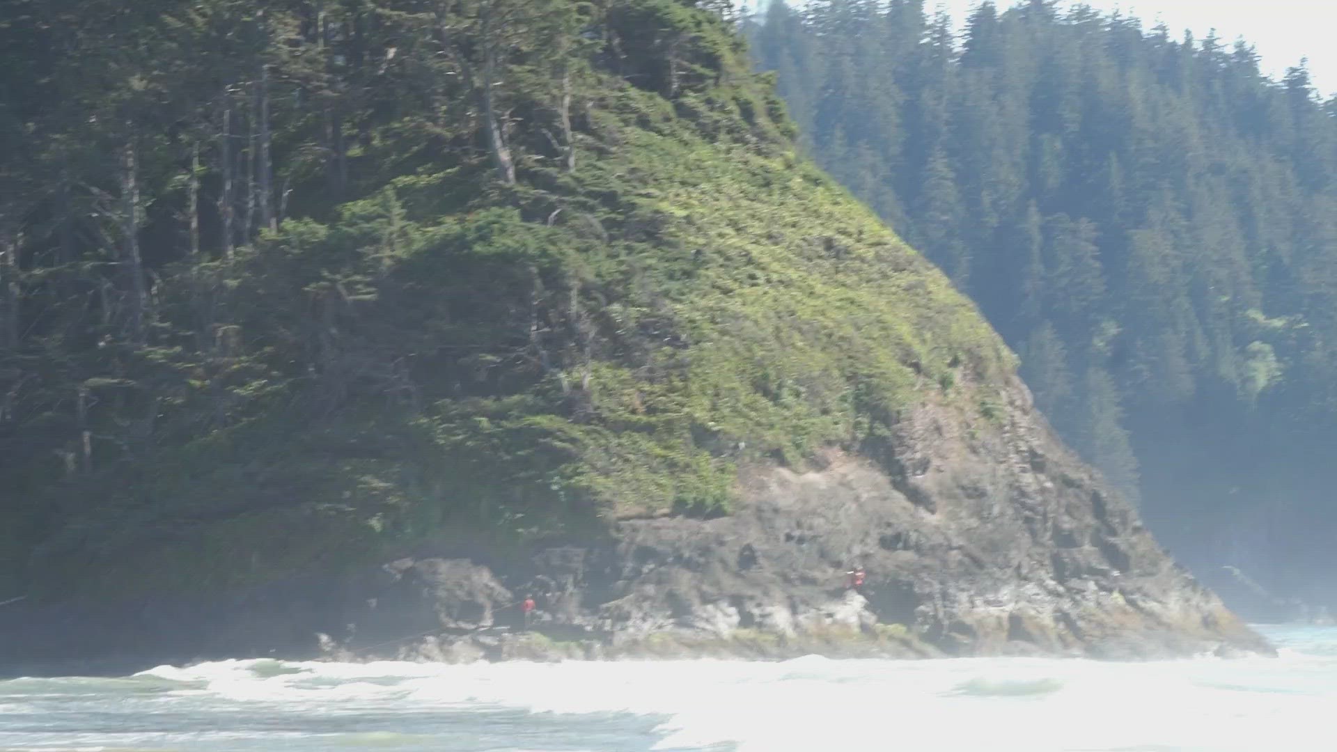 The Coast Guard says two people were rescued from shore on Saturday evening near Neskowin Beach.