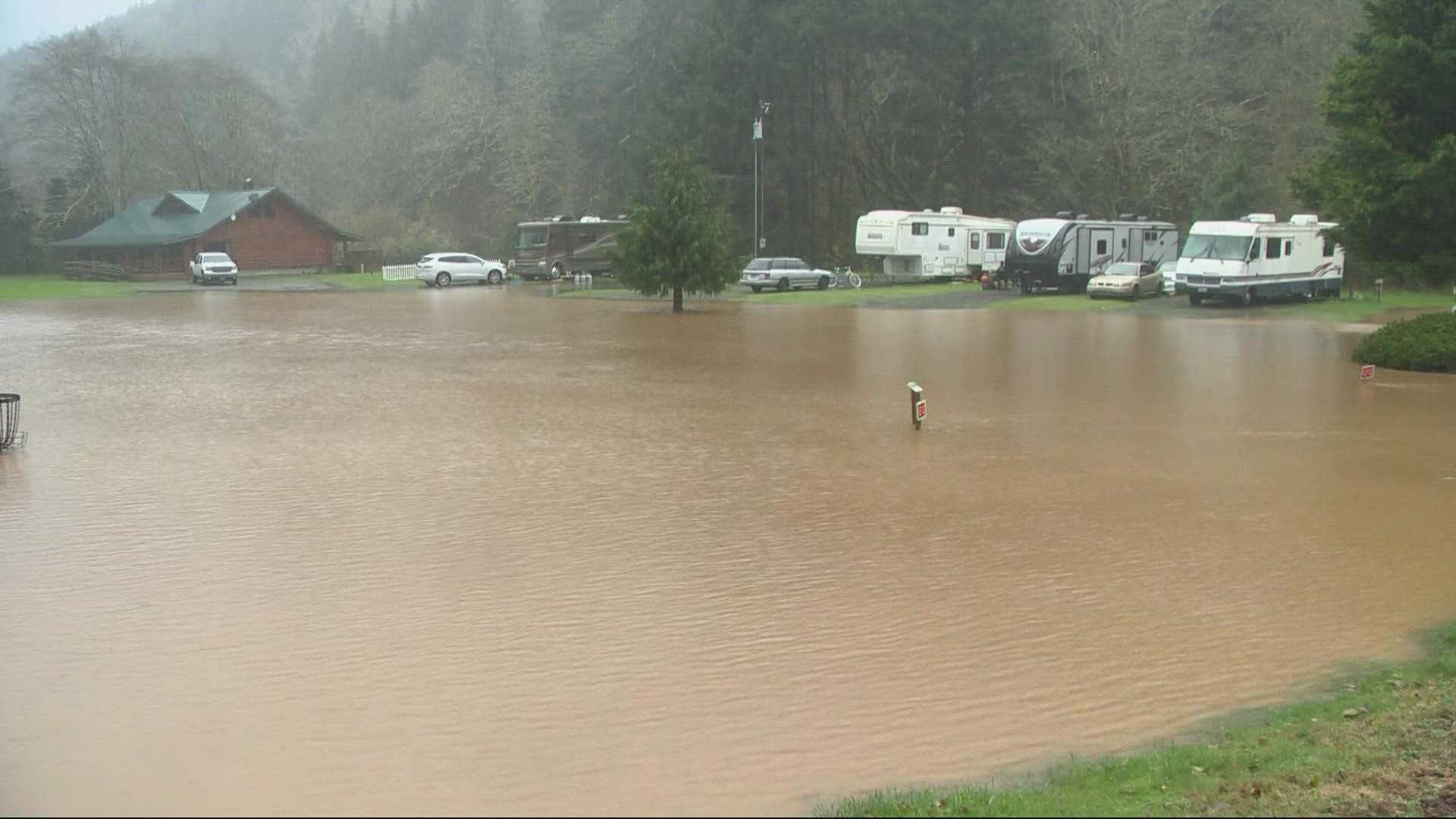 Marine deputies began evacuating residents by boat after a bridge carrying the park's sole access road over a creek appeared to be failing.