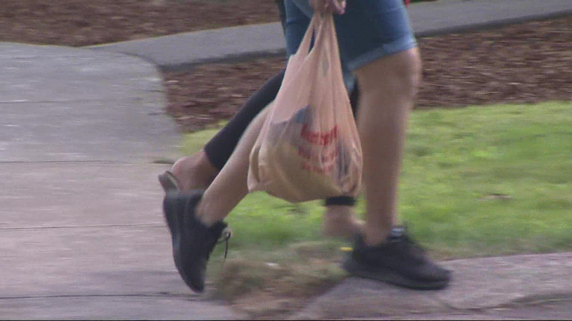 The state ban on single use plastic goes into effect on Oct. 1. Stores will provide paper bags or reusable plastic ones for eight cents each.