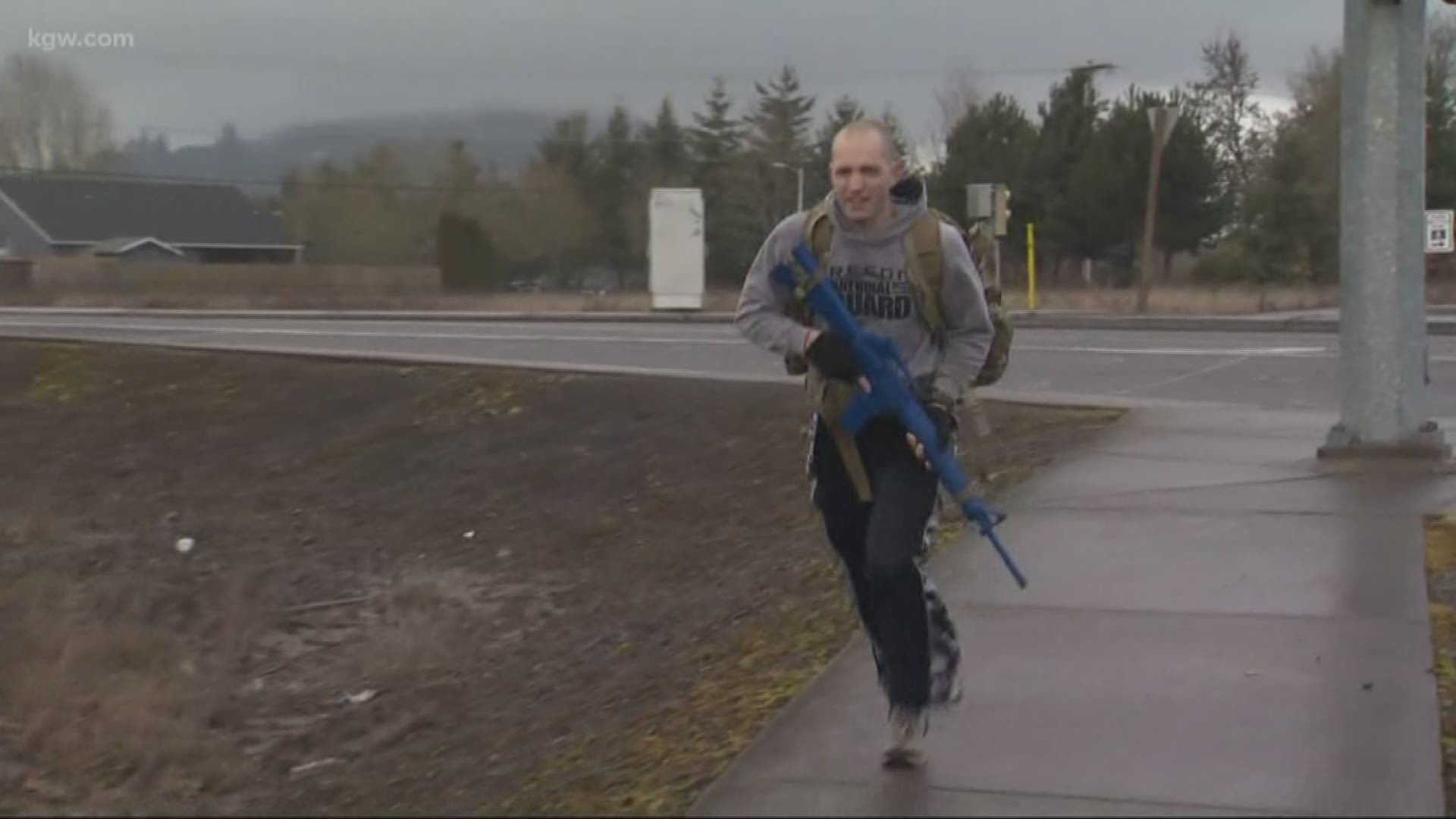 Sgt. Jonathan Osborne of the Oregon Army National Guard regularly exercises in uniform, a pack with 55 pounds of weights and fake blue rifle. At first, some Forest Grove neighbors were perplexed. Now, he's a bit of celebrity.