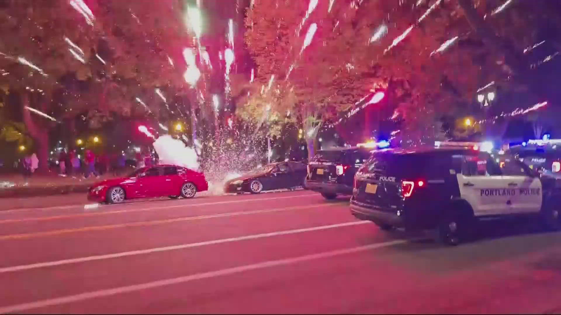 When officers tried to break up a street takeover at the Lloyd Center on Sunday, Portland police said that participants threw fireworks at them.