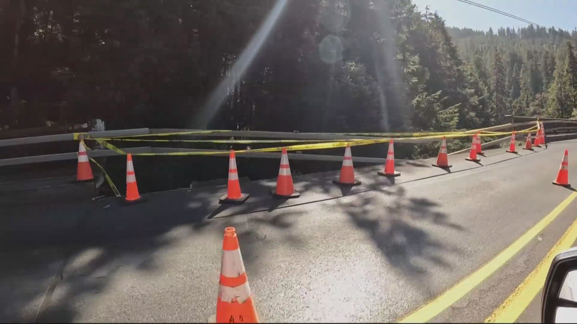 Necarney Creek Bridge on Highway 101 near Manzanita has been reduced to one lane due to a section of guardrail and sidewalk missing.