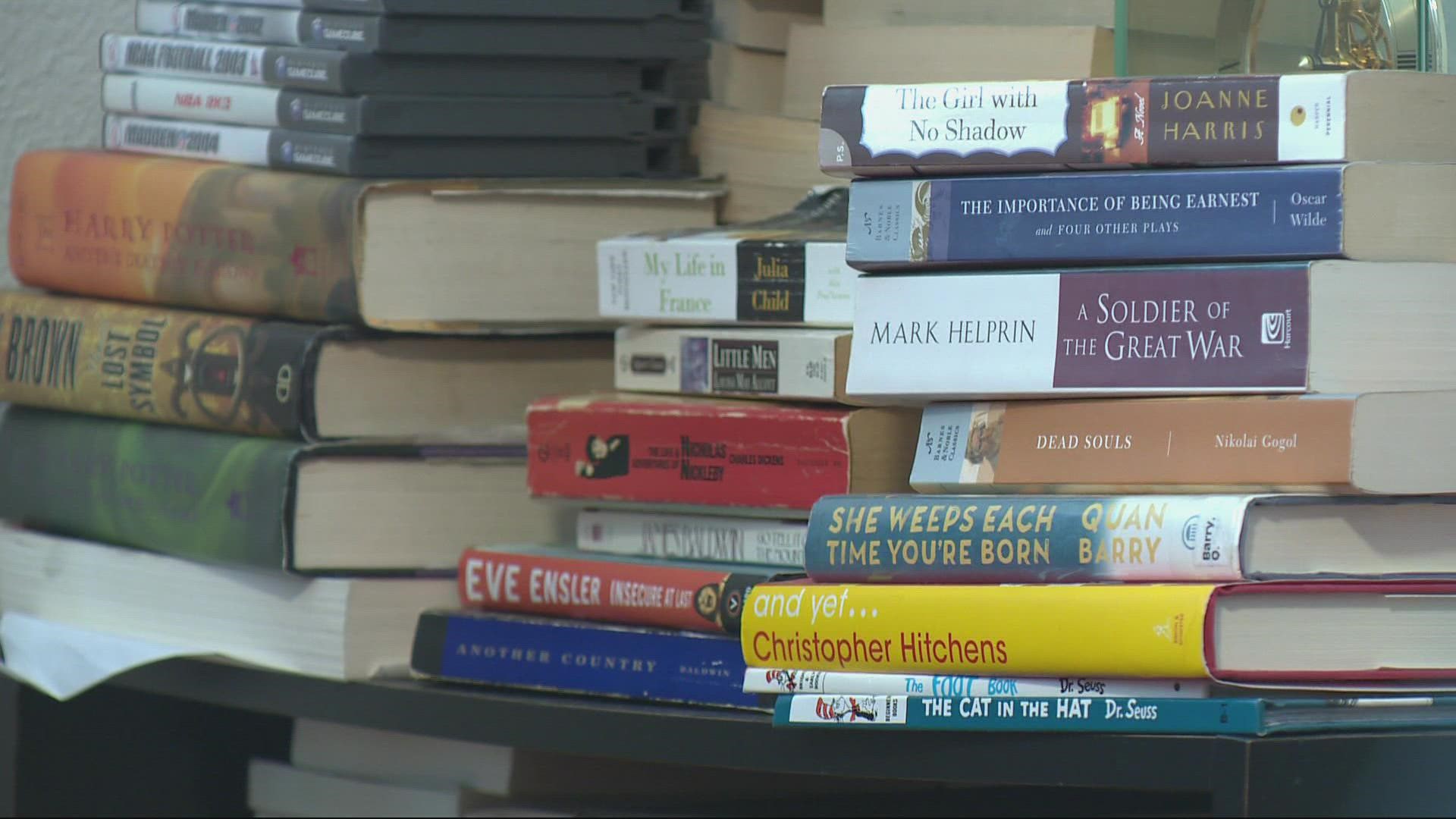 Dawdah Bah moved to Vancouver from West Africa in 2002. He is selling and collecting books to bring back to his hometown.