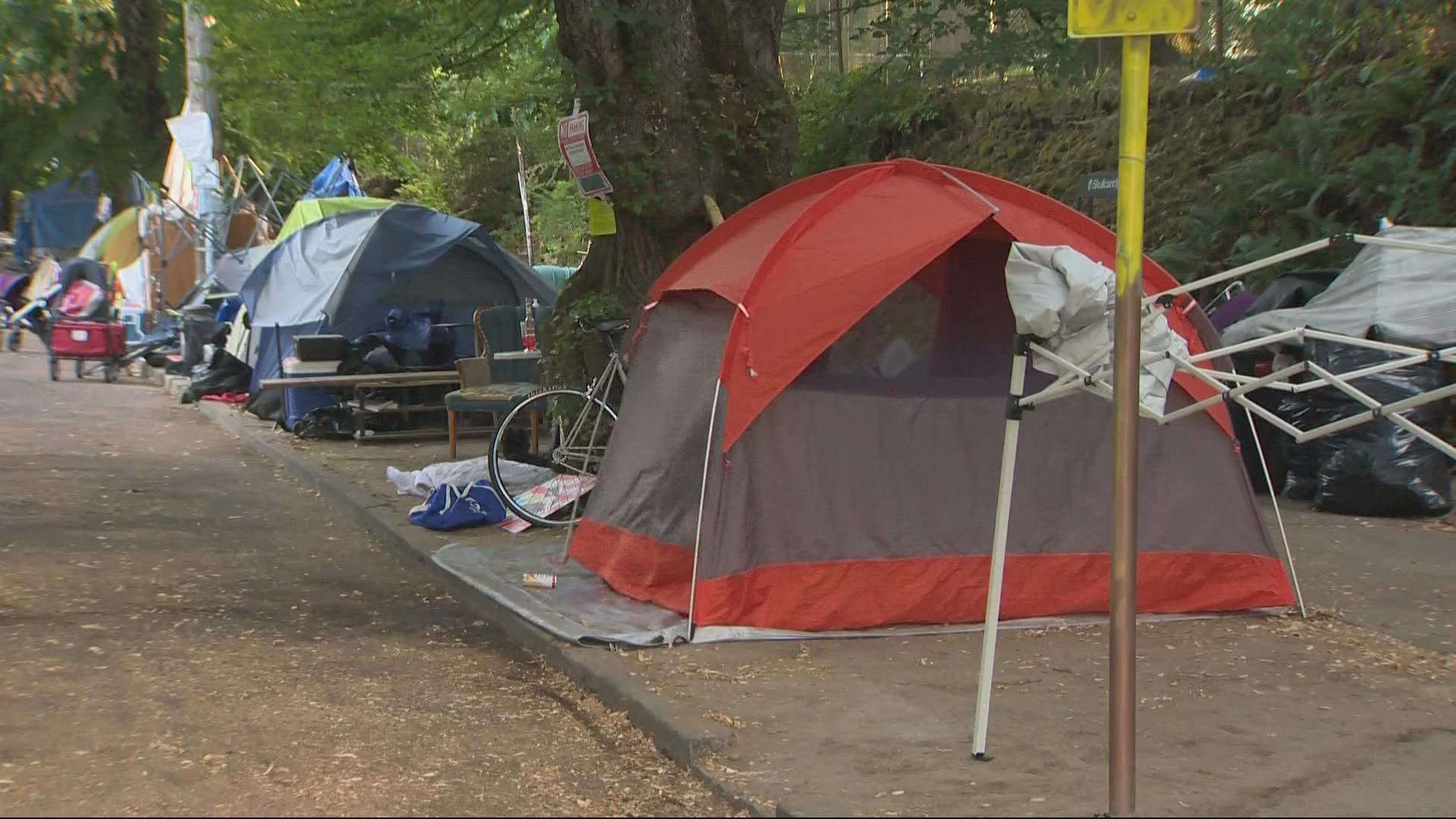 Police and biohazard crews showed up first thing Thursday morning to clear the camp that has been building up for months. Maggie Vespa reports.