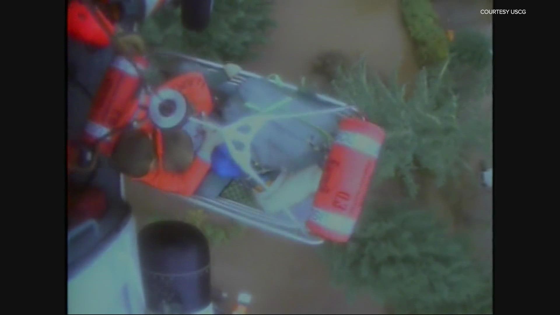 A U.S. Coast Guard helicopter crew rescued 10 people in Forks, Washington who had been trapped on rooftops by flooding over the weekend.