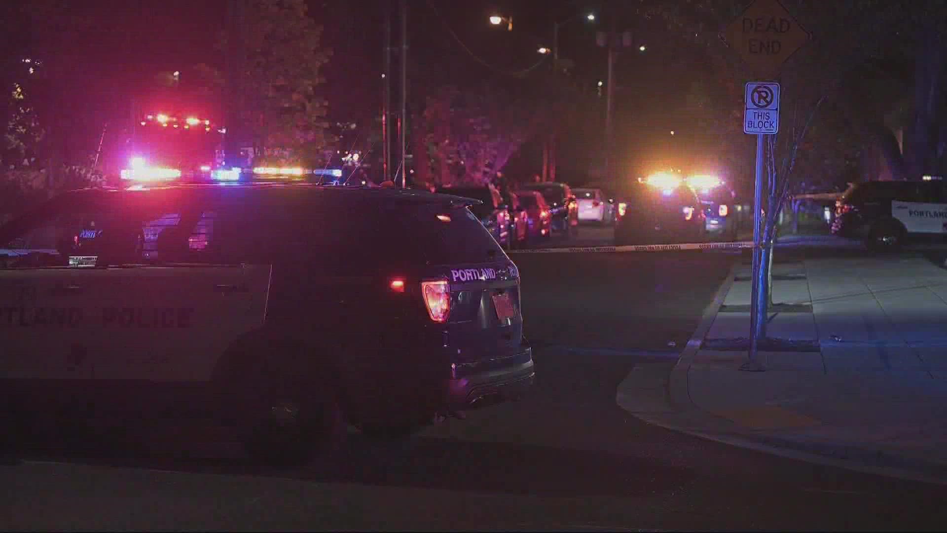 A man died and a woman was injured after a stabbing in Northeast Portland early Monday morning. Police say a man was detained as part of the investigation.