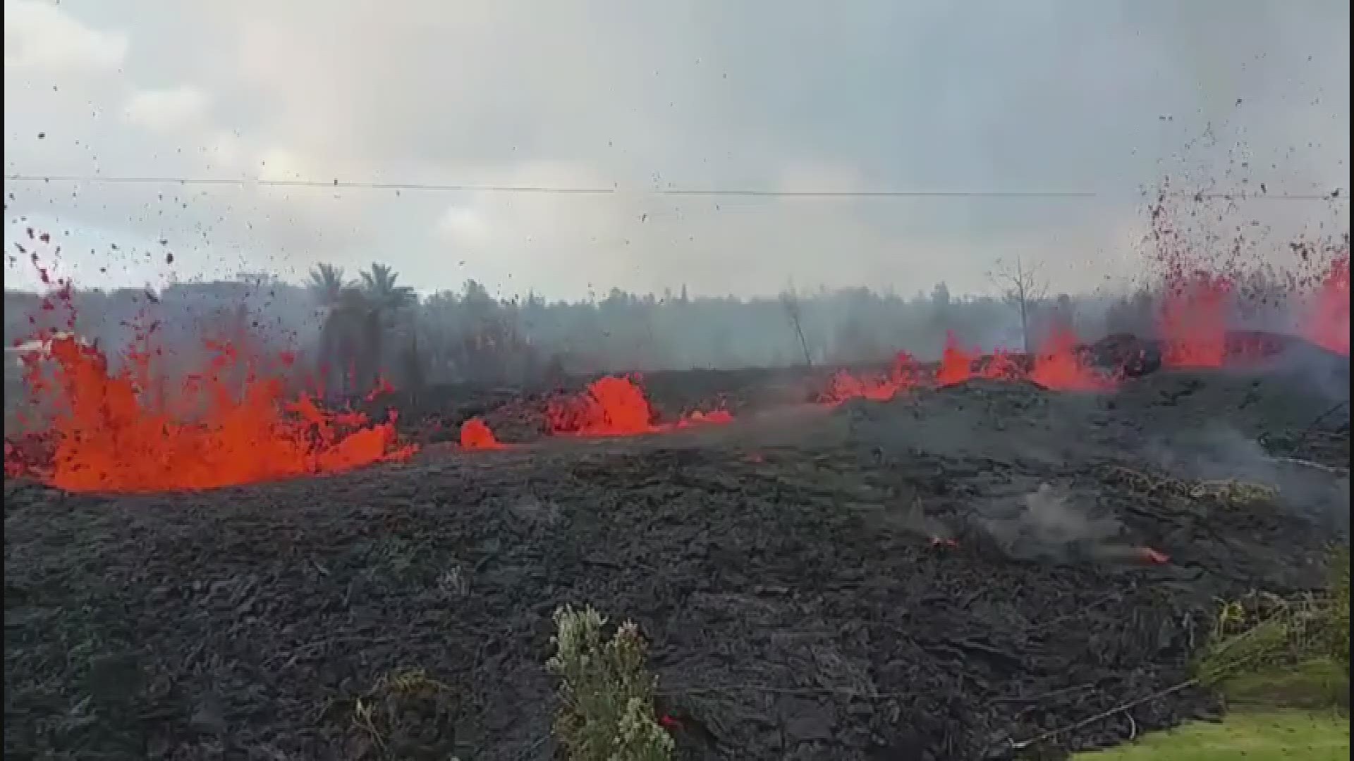 Vancouver native Travis Sanders shot this video from the roof of a home as the lava flow from Kilauea approached Leilani Estates on Hawaii's Big Island