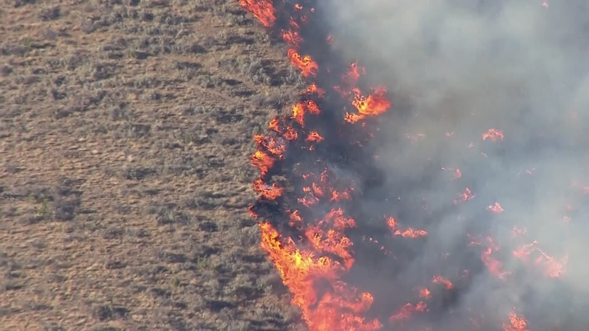 Sky 8 was over the wildfire burning near Warm Springs.