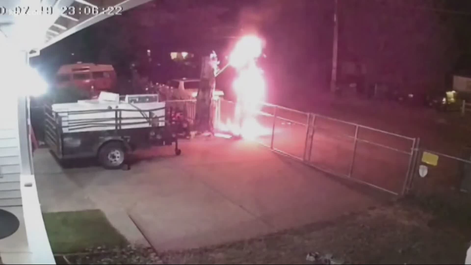 A family caught vandals on-camera lighting their American flag on fire.