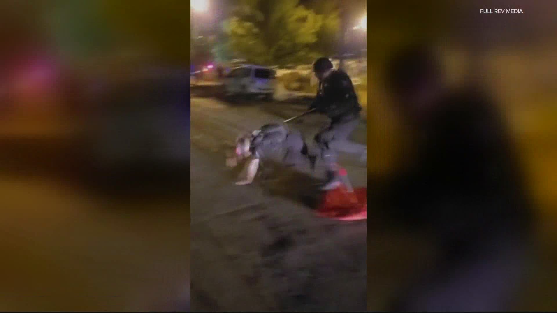 Officer Corey Budworth has been indicted by a grand jury and has been charged with one count of assault stemming from an incident during an August protest.