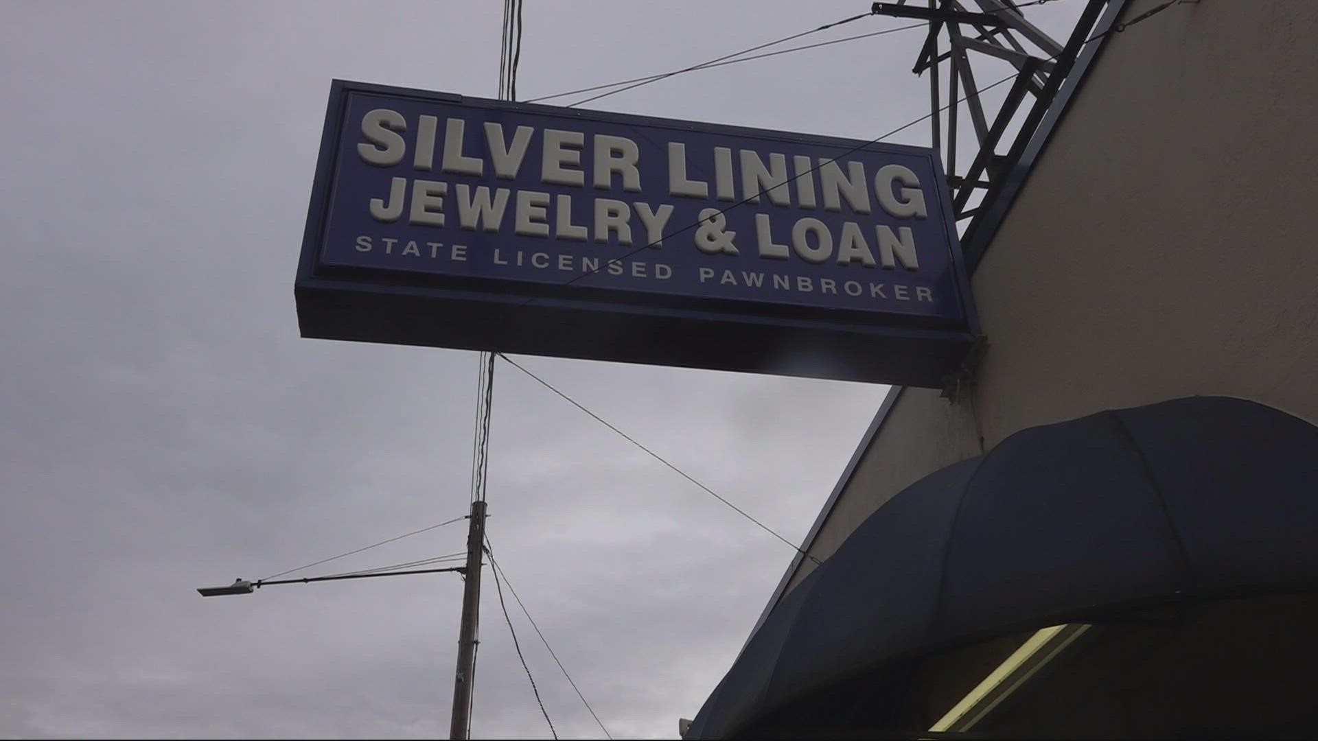 The owner of Silver Lining Jewelry and Loan Company says high costs are bringing people in to pawn their stuff or buy things on the cheap.