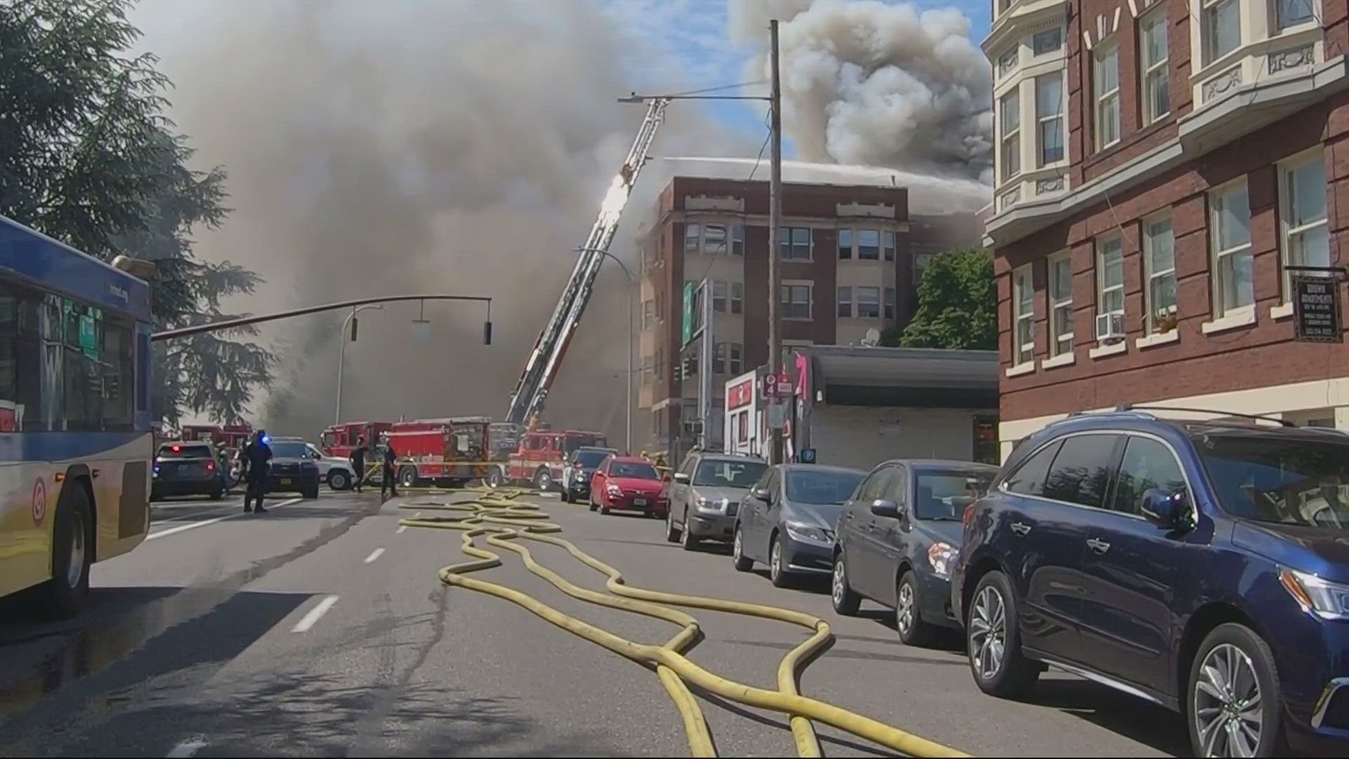 The 100-year-old building at Southwest 13th and Taylor went up in flames on Tuesday. Firefighters had to rescue multiple people.