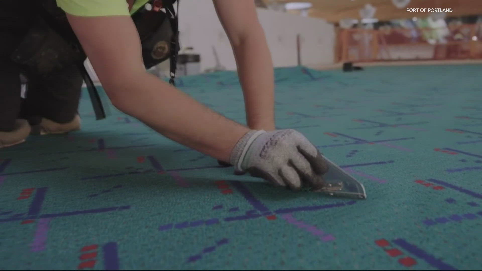 The iconic PDX teal carpet has been laid out, with the renovated main terminal is set to open in August.