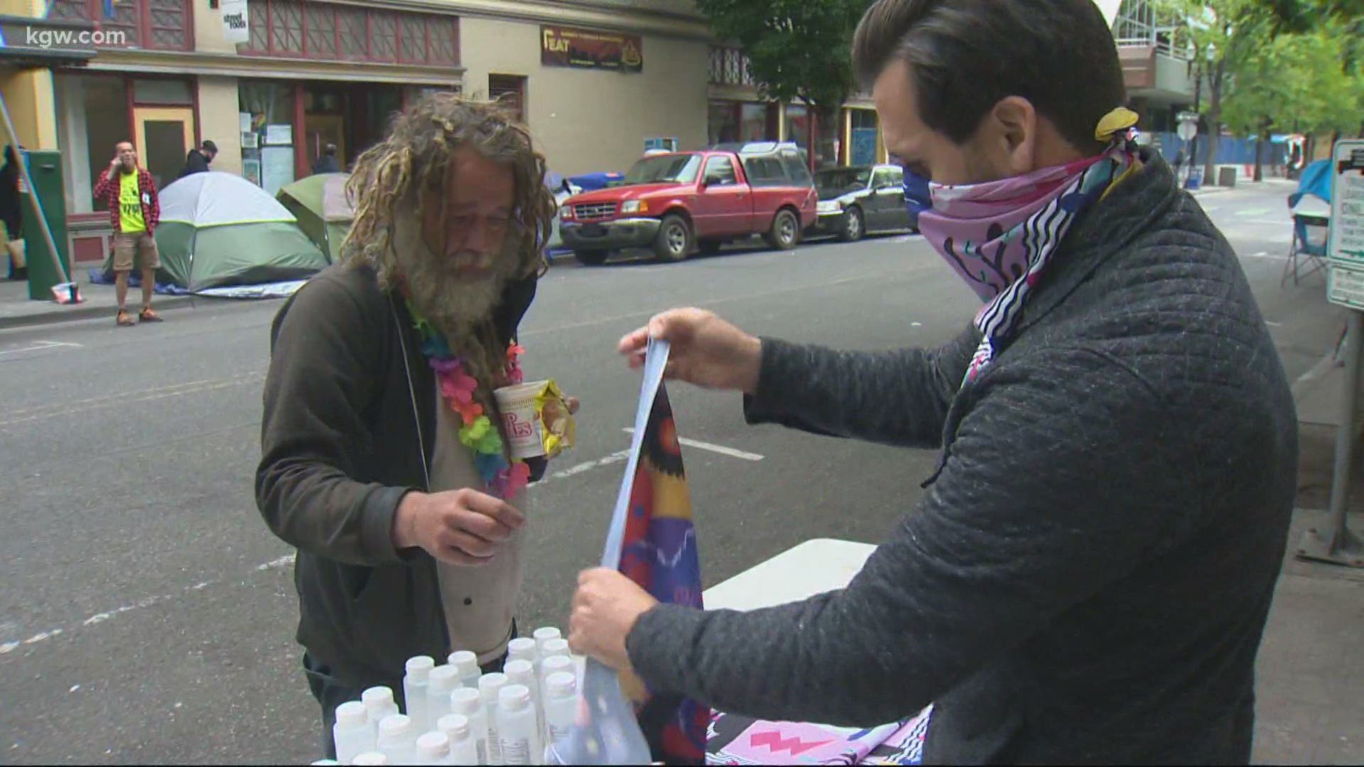 Street Roots is partnering with a design company to hand out colorful bandanas that can be used as face coverings.