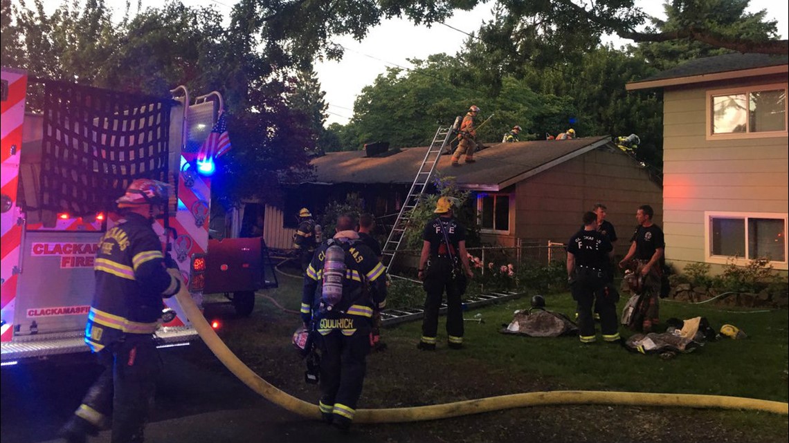 Two rescued from burning Milwaukie home, one in critical condition