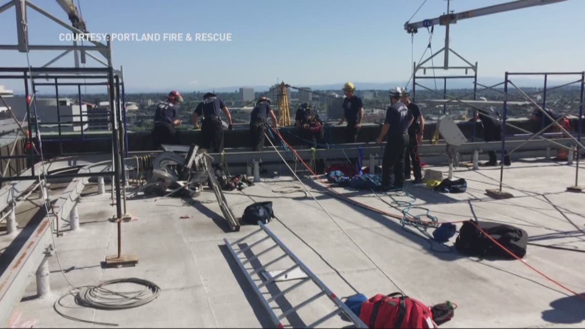 Workers trapped 15 stories high on scaffold in downtown Portland ...