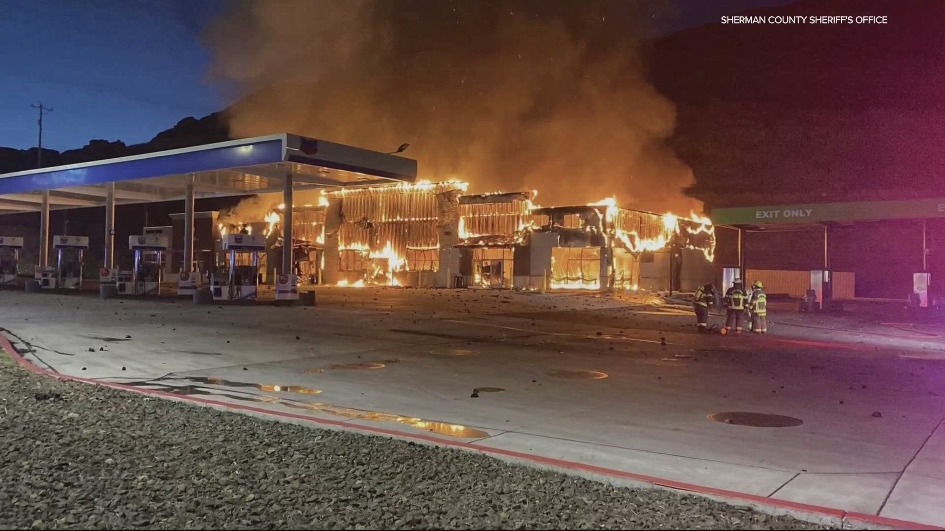 The Sherman County Sheriff's Office posted photos showing most of the truck stop's central building engulfed in flames early Tuesday morning.