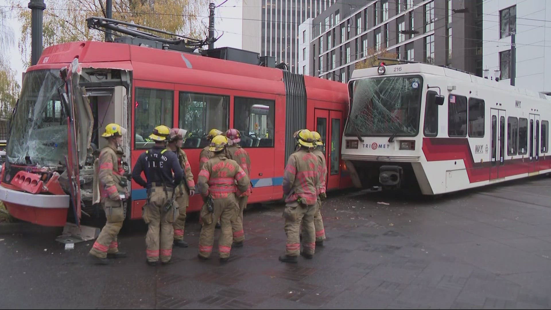 The crash left two people injured and caused the train and streetcar to derail.