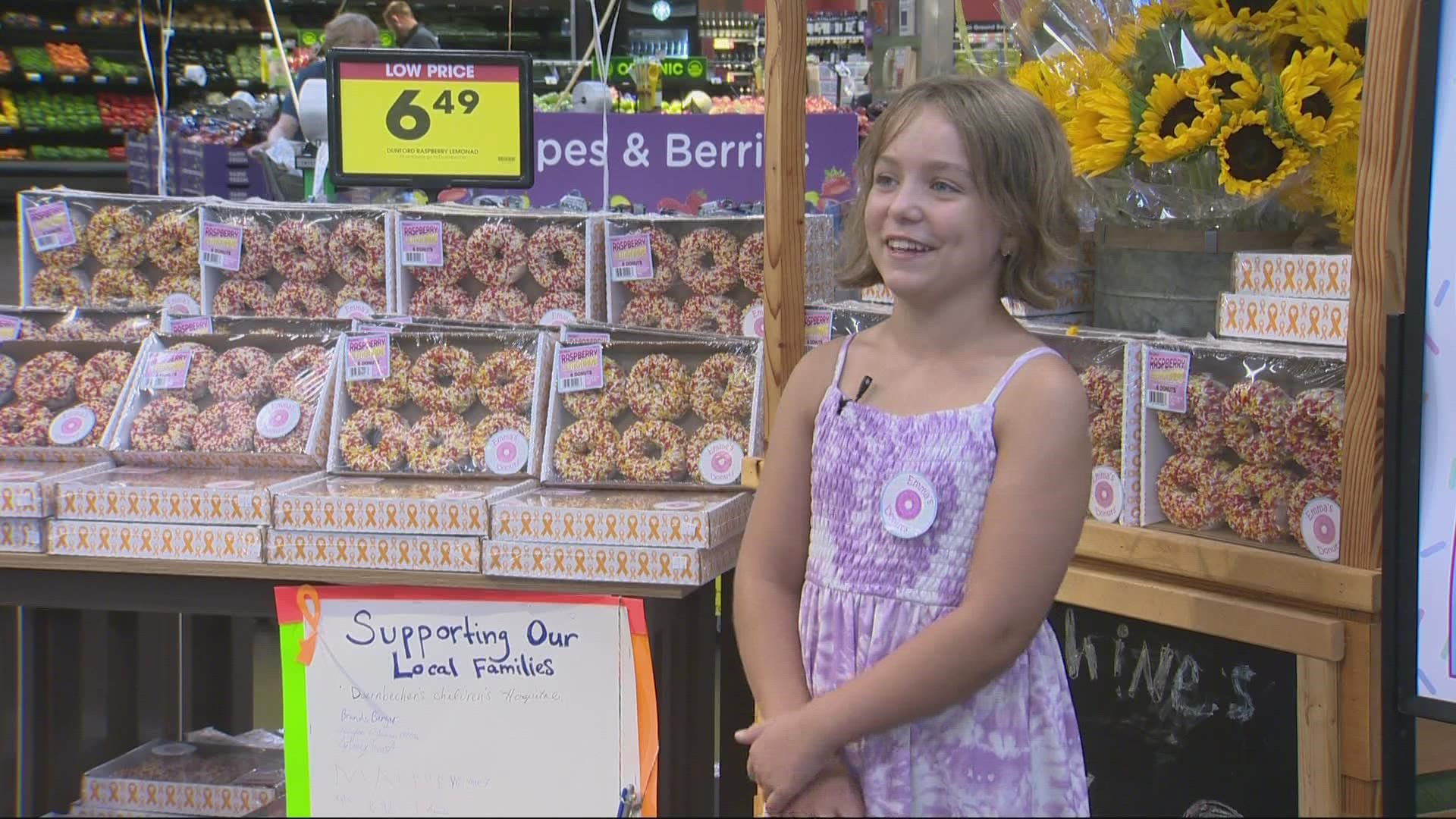 An Albany family and their 9-year-old daughter support kids fighting cancer by selling donuts at local Fred Meyers.