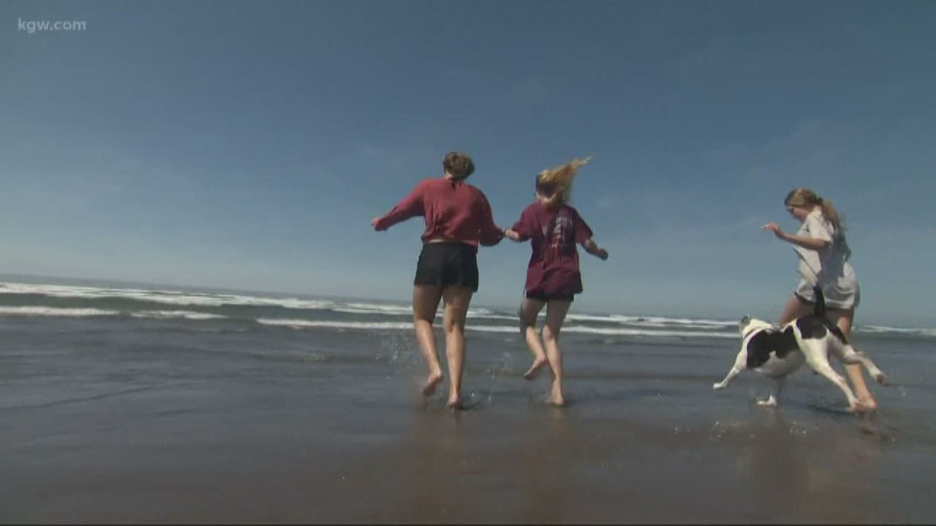 After a day of record-setting heat on the Oregon Coast, residents and tourists enjoy the drop in temperature to normal summer weather.