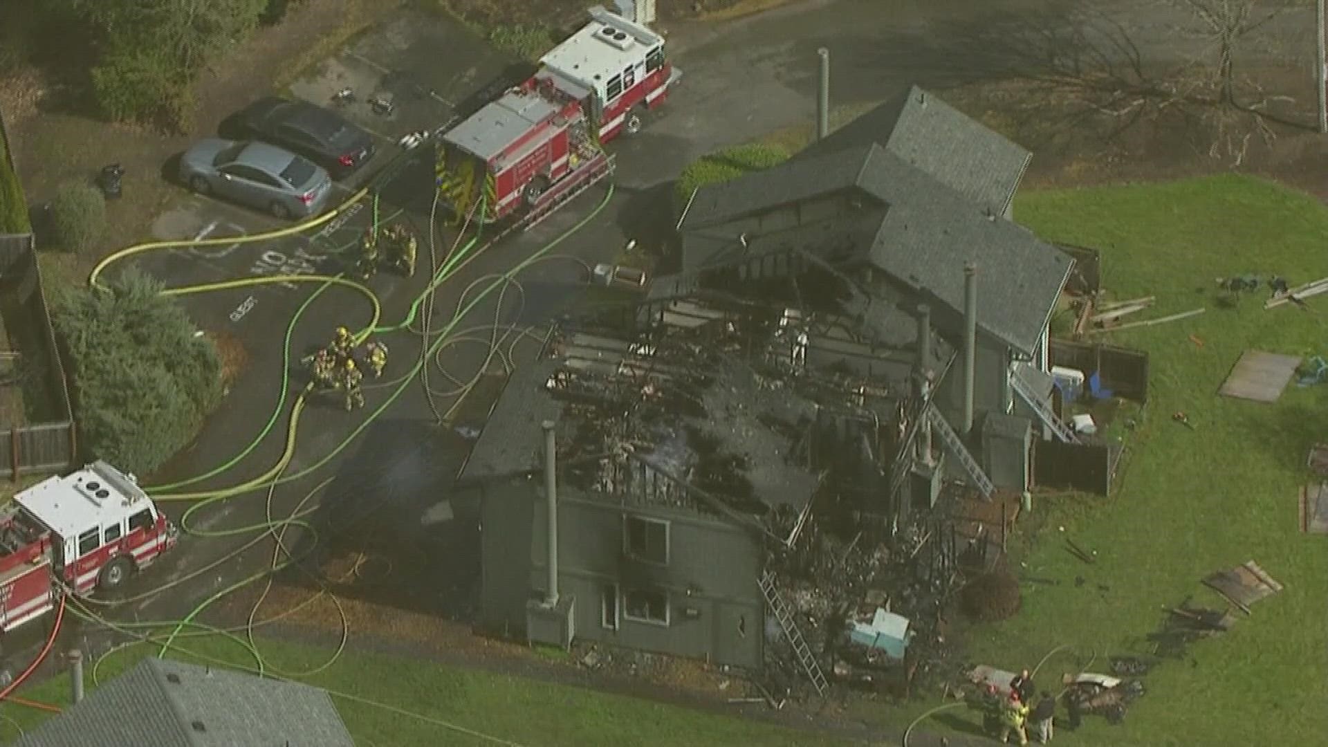 One person was hospitalized and a middle school released its kids early following a townhome fire in Beaverton.