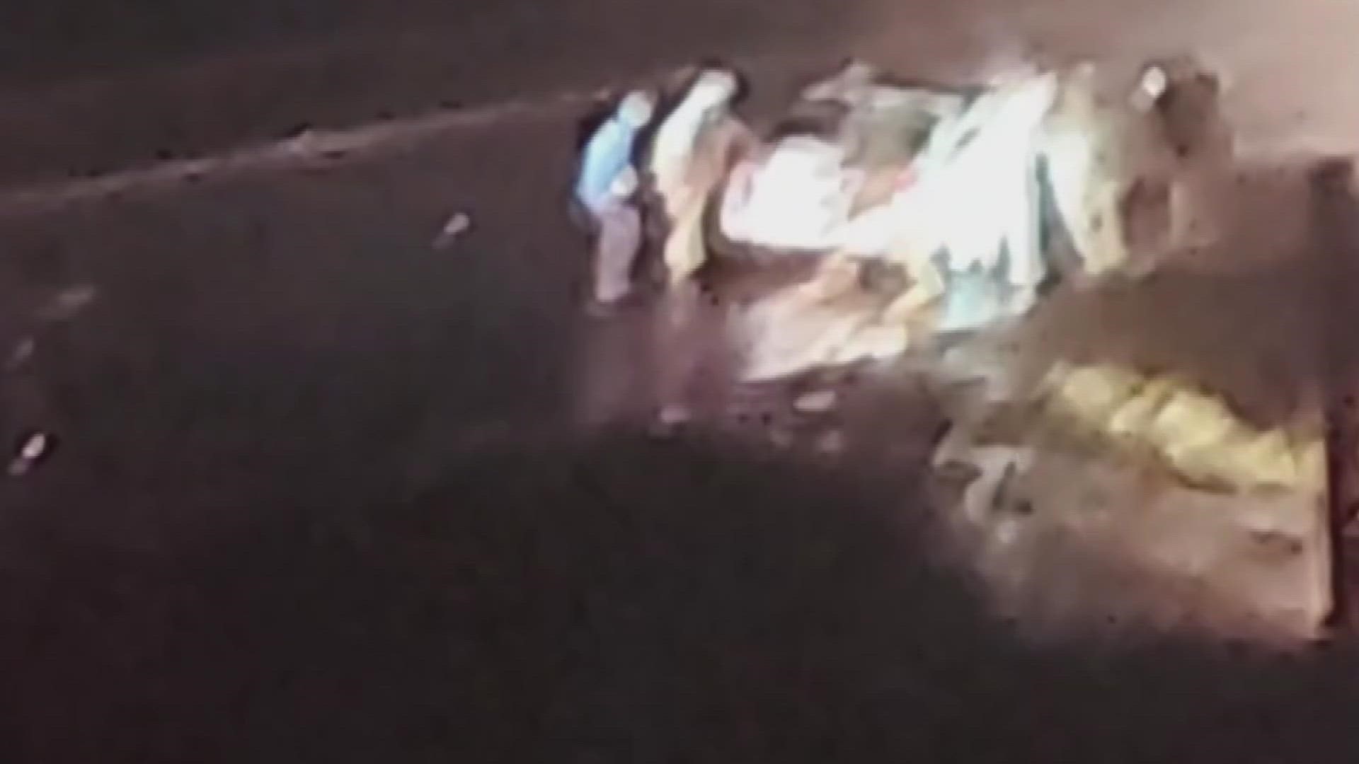 Viewer Danny Maddox shared a video that appears to show the moment authorities rescued the woman from the vehicle during the standoff on Highway 101 on March 3.