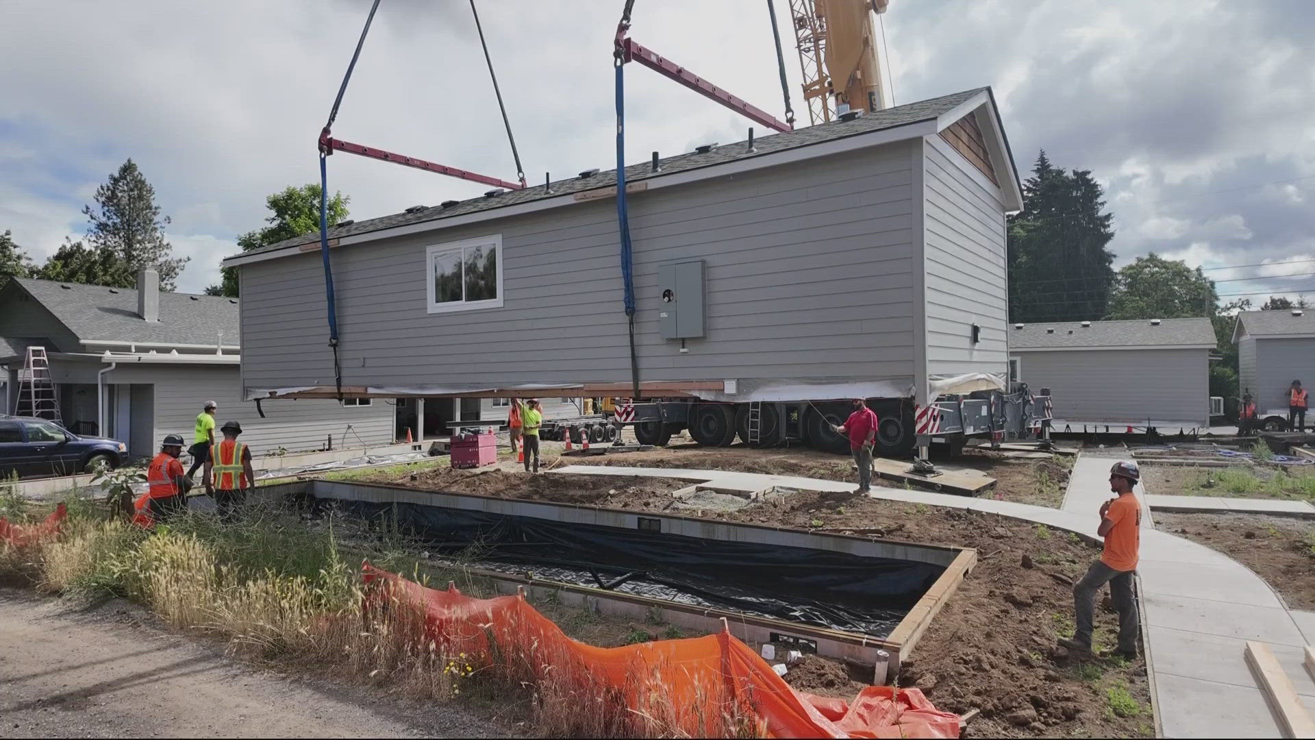 The pre-built tiny homes are part of a community being developed by the nonprofit "Community Roots Collaborative."