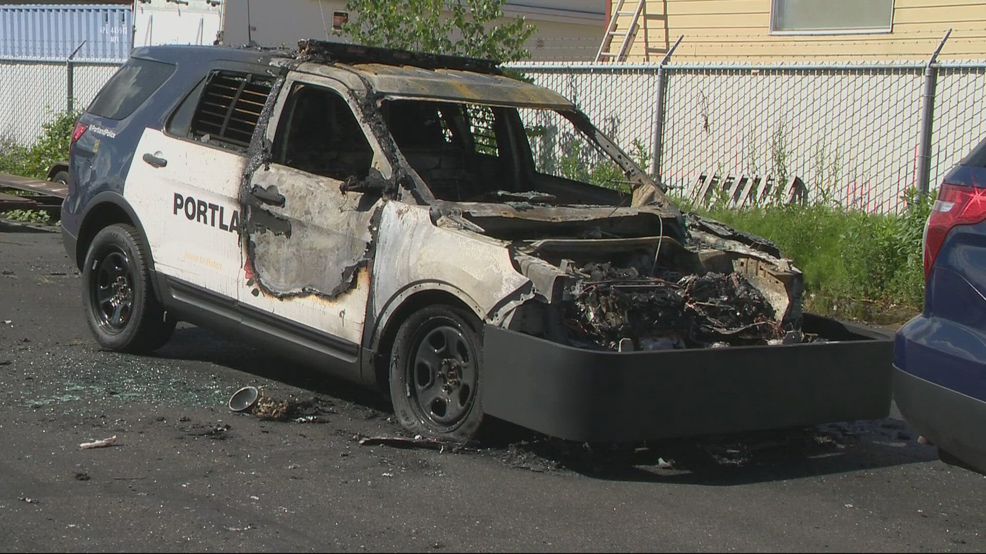 Portland police said a masked suspect cut through a fence around a police training lot and set 15 vehicles alight.
