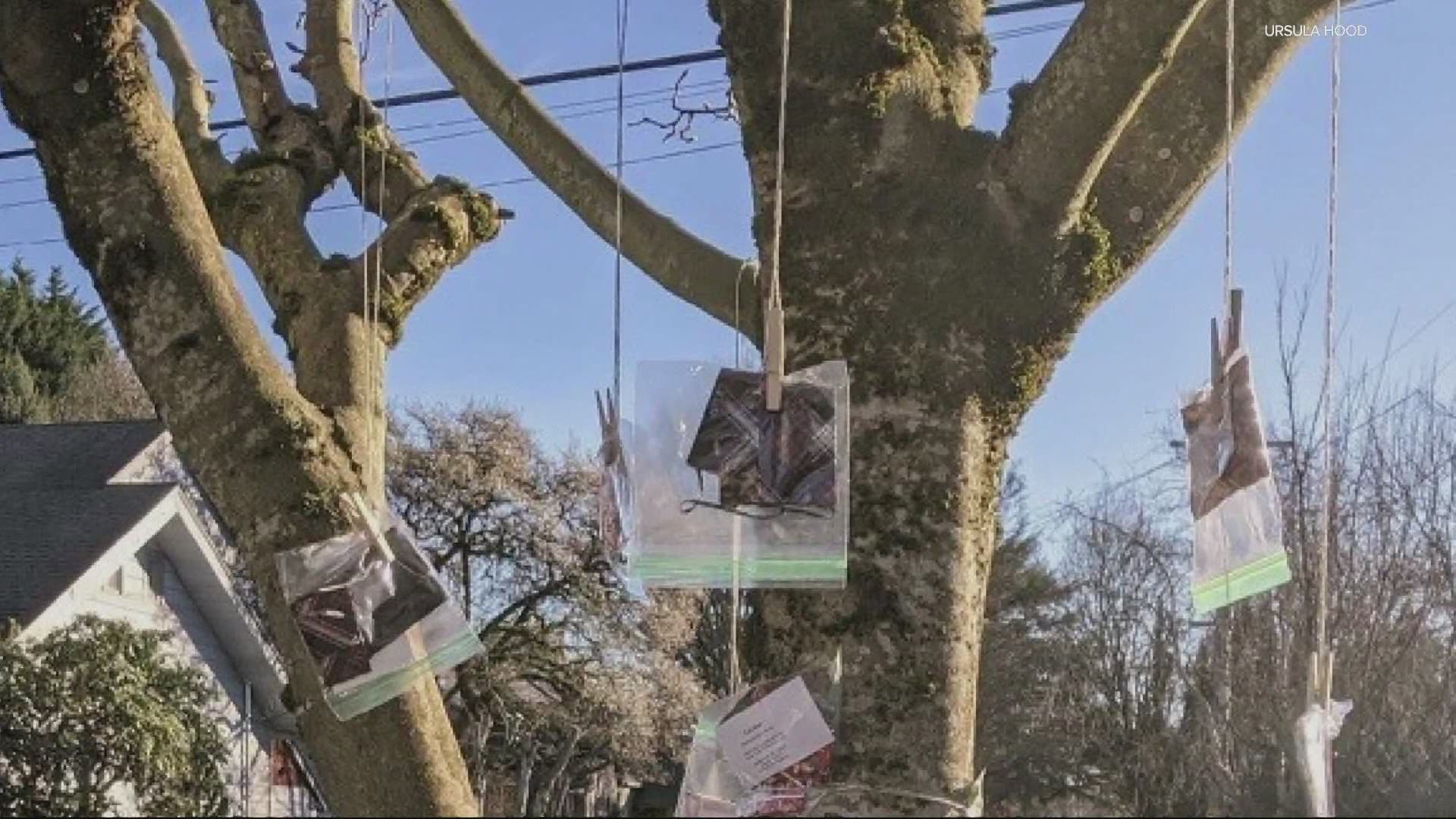 Ursula Hood hangs her handmade facemasks from the branches of a tree and gives them out all over Portland; her daughter nominated her for the award