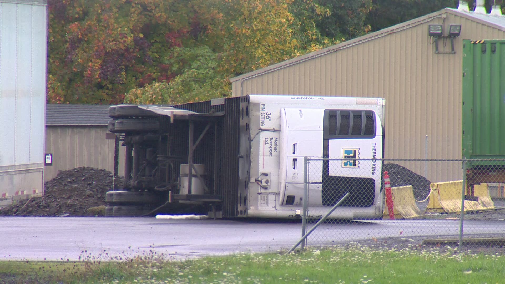 A small tornado knocked over some semi trailers and damaged a fence and some birch trees on Sunday, October 28, 2018 in Portland, Oregon.