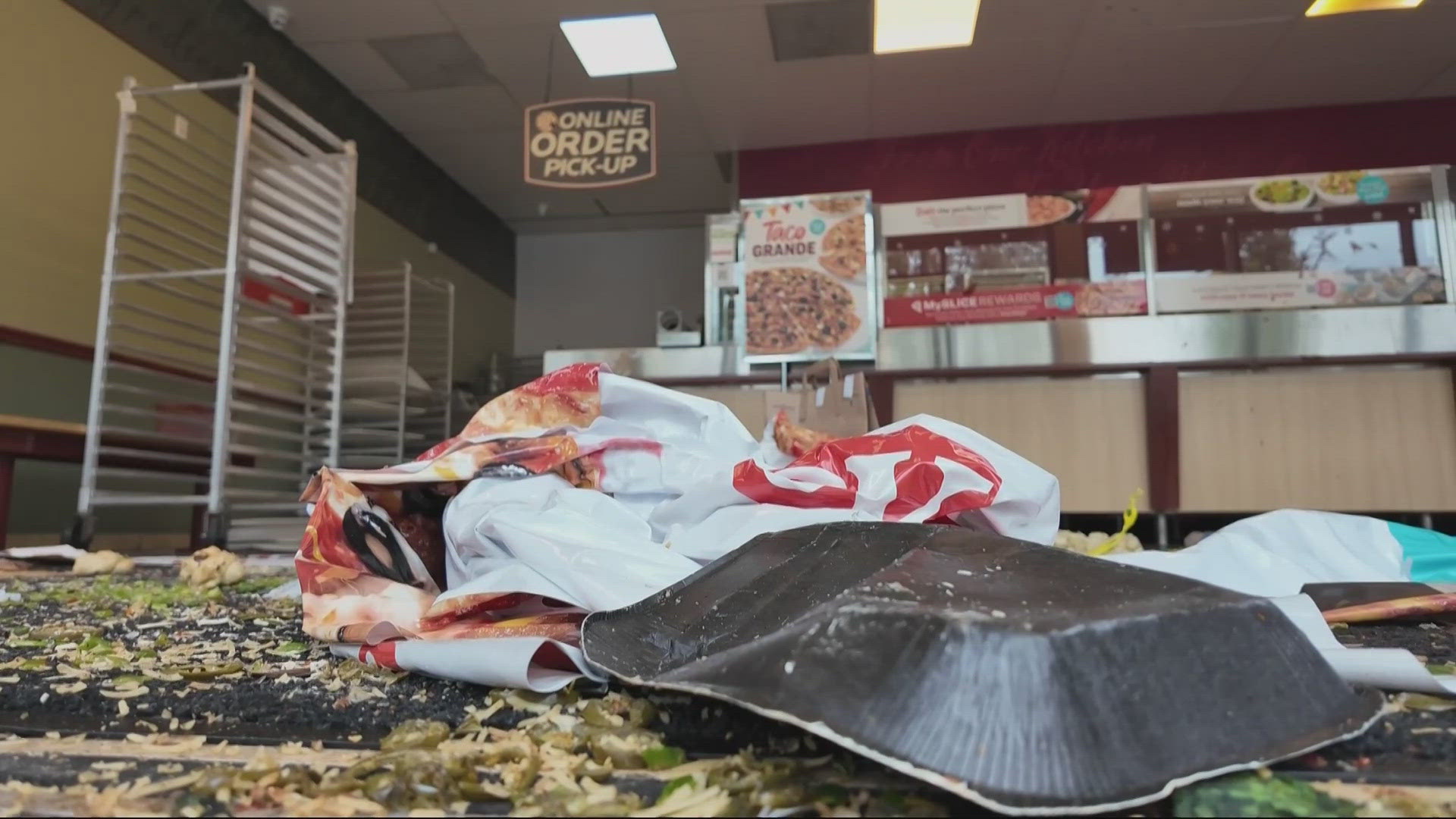 Police helped employees evacuate after the man entered the Woodstock store and started threatening workers; he eventually surrendered to officers. 