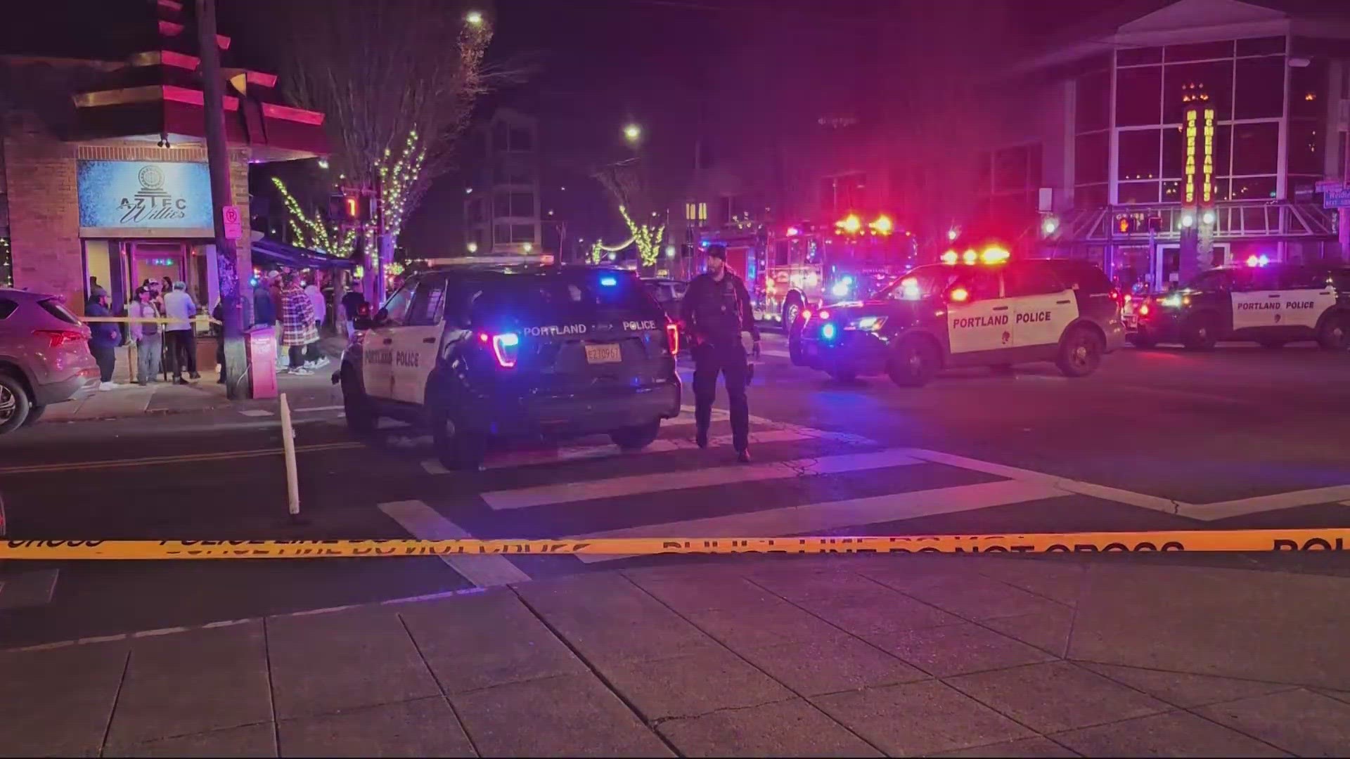 Shots were fired from a passing car around 1:12 a.m. on Sunday, outside of a bar near Northeast Broadway, according to the Portland Police Bureau.