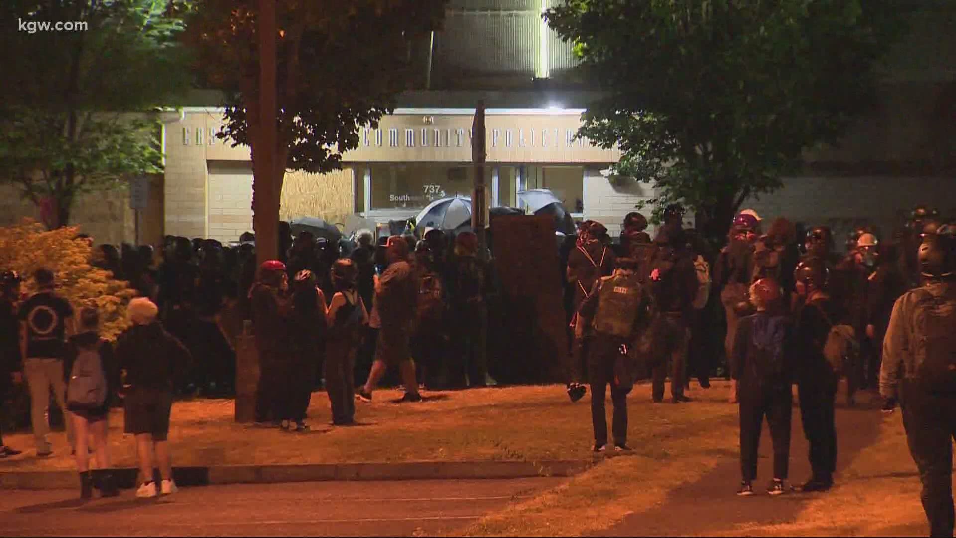Portland Mayor Ted Wheeler said people tried to burn down the East Precinct while dozens of officers and civilians were trapped inside.