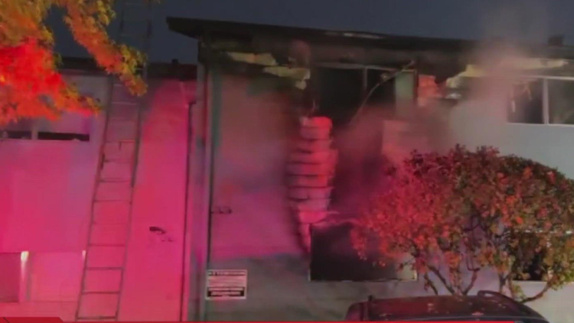 Two people rescued from second-floor balcony after fire at Beaverton ...