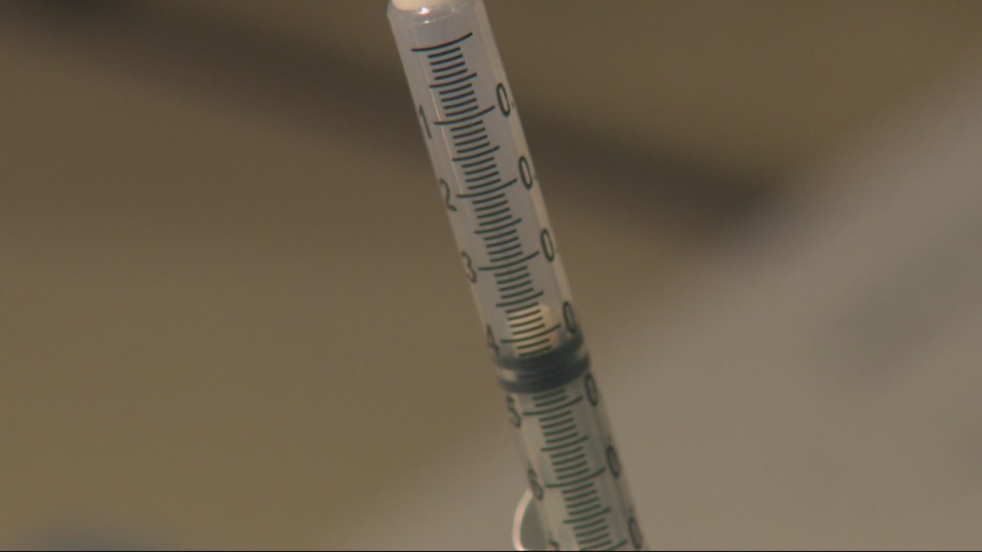 People with health conditions and frontline workers have mixed reactions to the news about updated vaccine priority. Galen Ettlin reports.