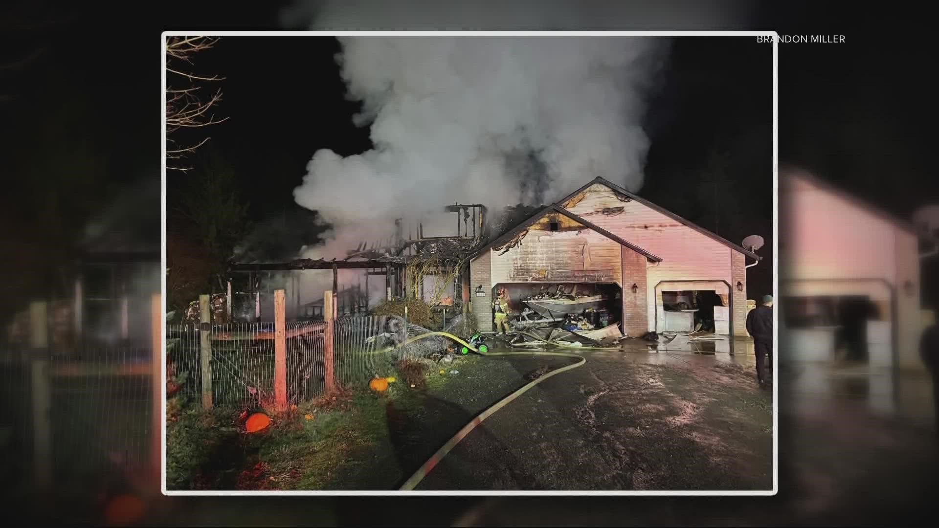 A La Center, Wash. home was fully engulfed in flames when firefighters, including the homeowner, arrived on scene on Monday.