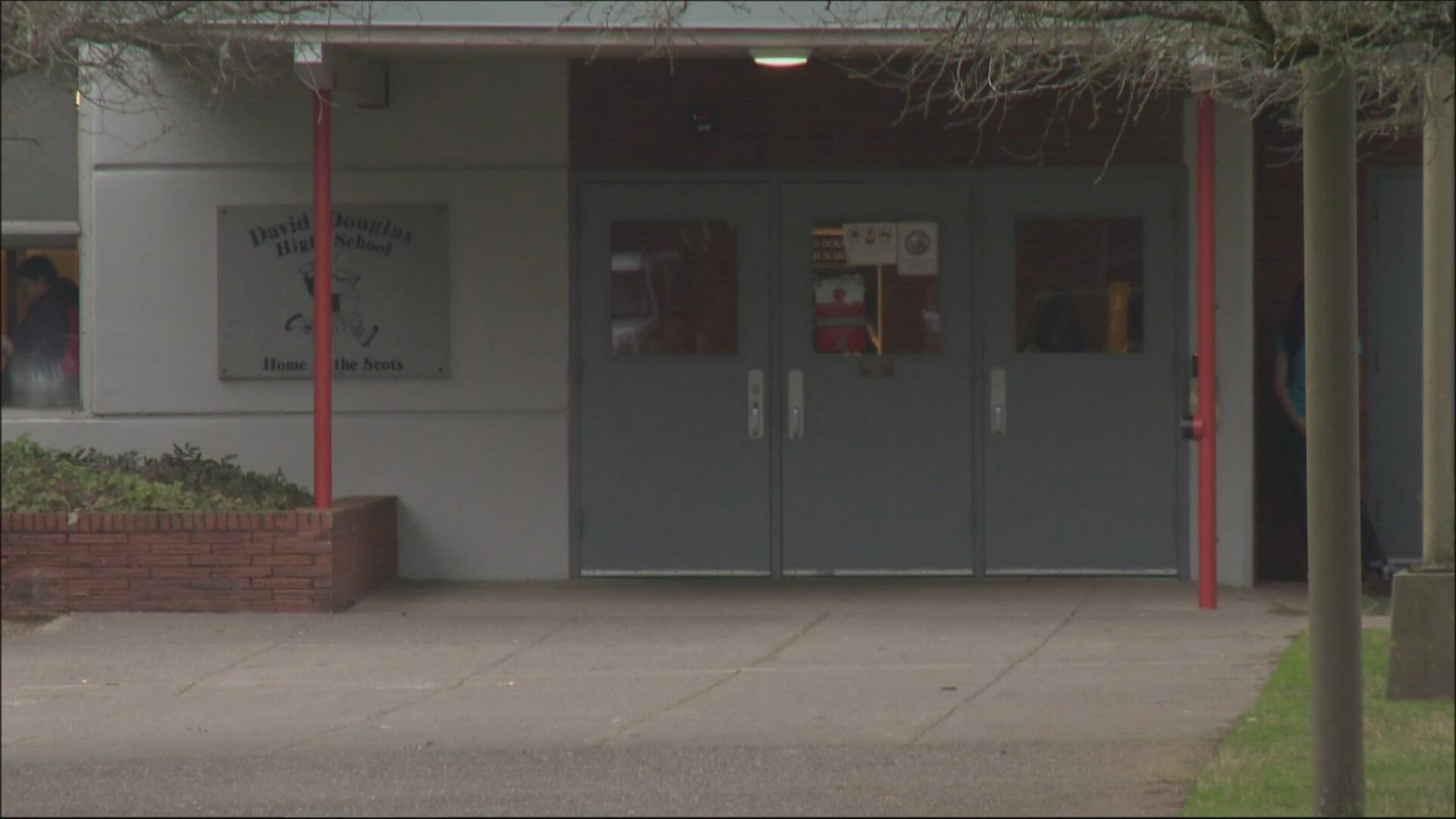 The Oregon School Activities Association says it's investigating allegations of racial slurs and taunts targeting athletes at David Douglas High.