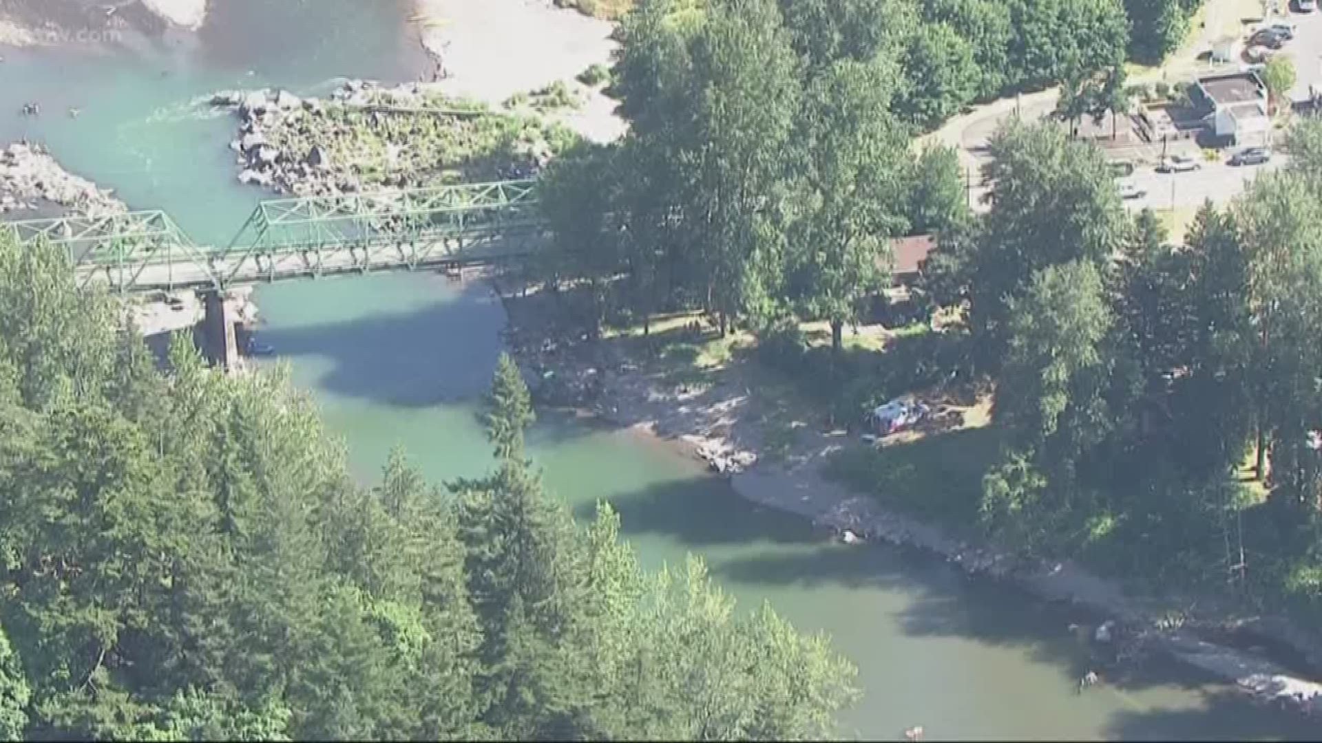 Rescuers pulled a person from the river at Glenn Otto Park