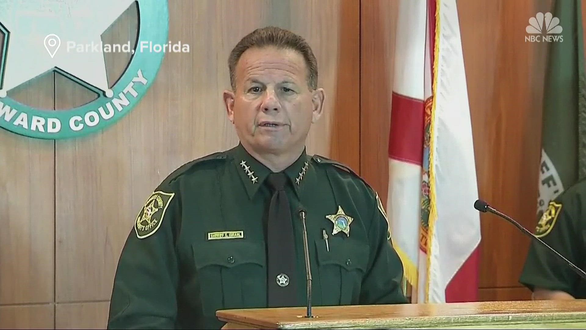Broward County sheriff suspends school resource officer who remained outside Marjory Douglas Stoneman High School during gunman's deadly rampage.  NBC's Edward Lawrence reports.