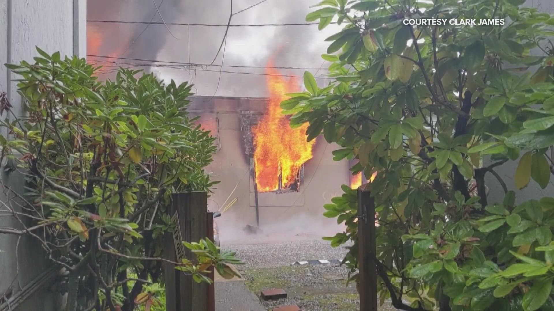 Video taken by Clark James shows a building housing a number of businesses along SE Hawthorne & 13th overtaken by a large fire.