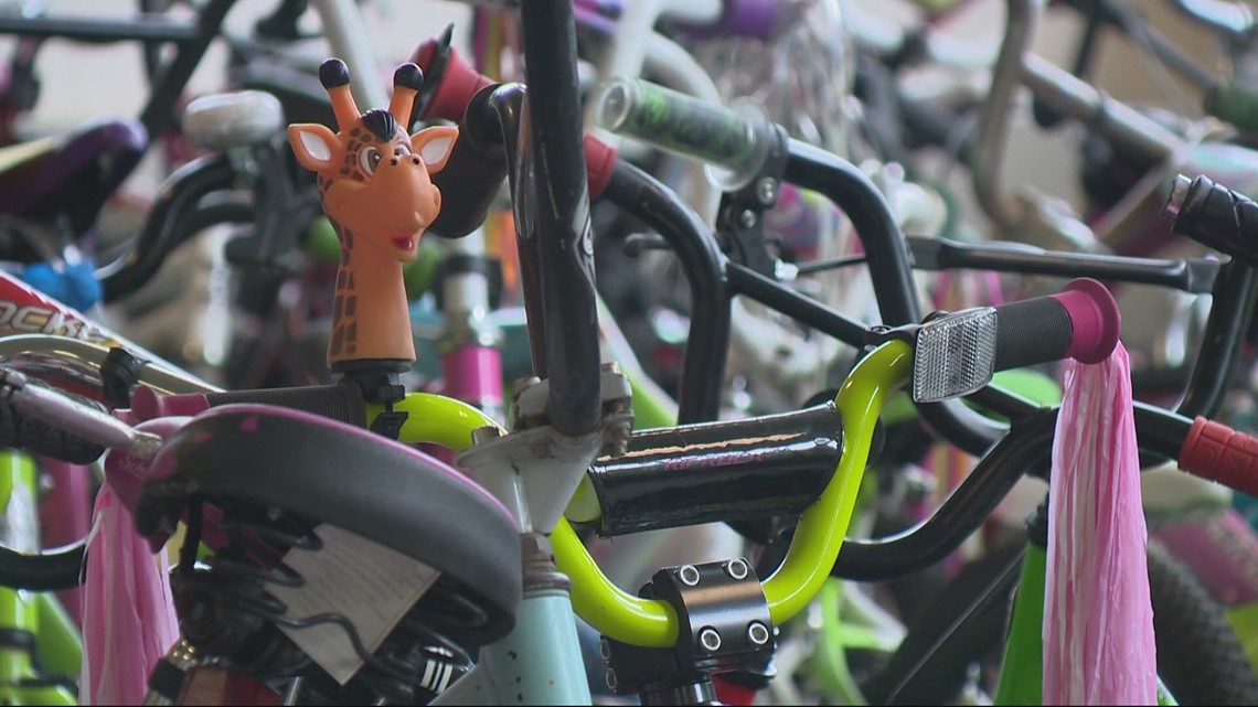 Portland organization fixes up donated bikes for refugees, the homeless