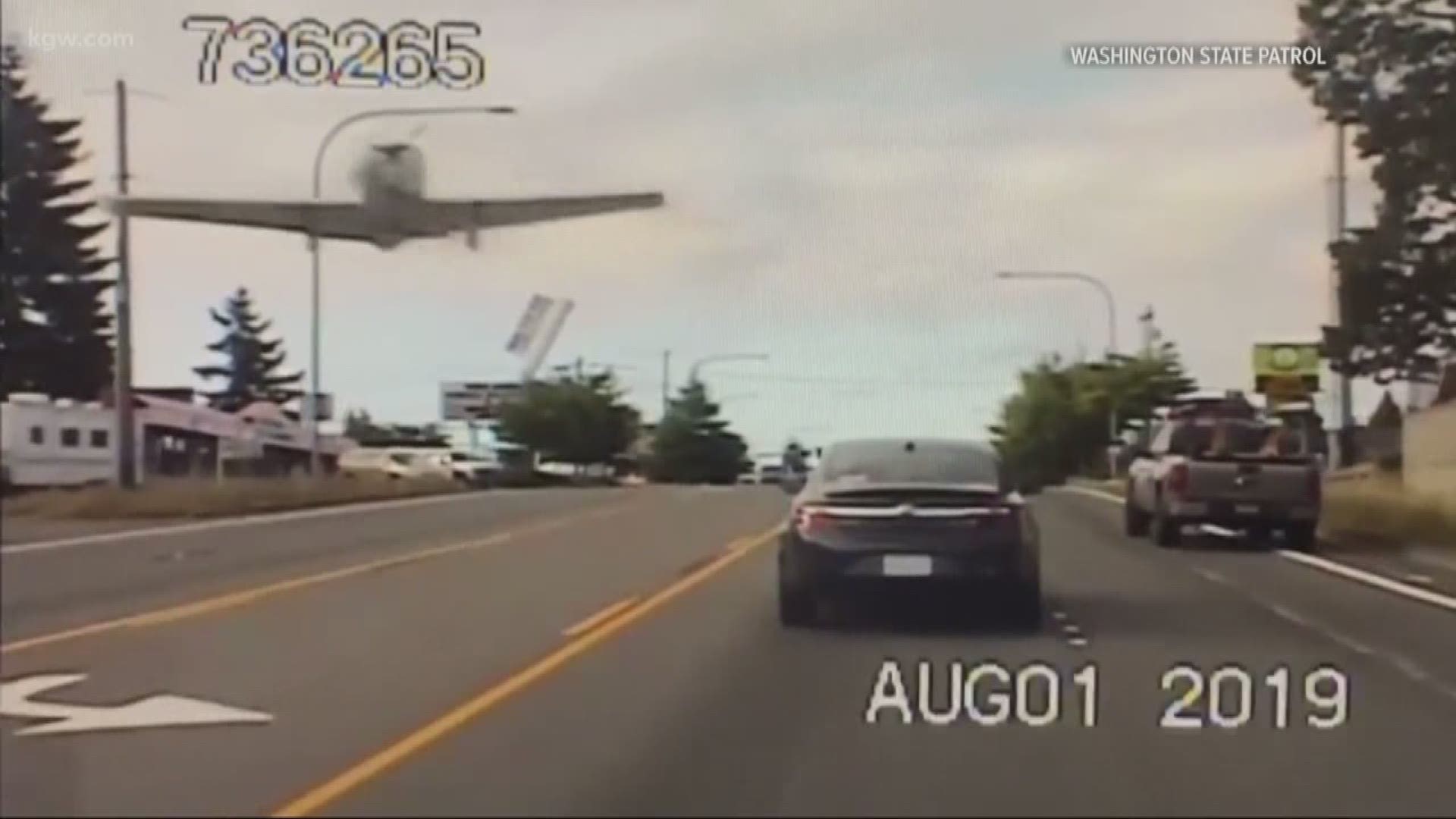 A small plane was forced to land on Pacific Avenue in Spanaway Thursday morning after a fuel system malfunction. Trooper Clint Thompson caught it all on his dash cam.