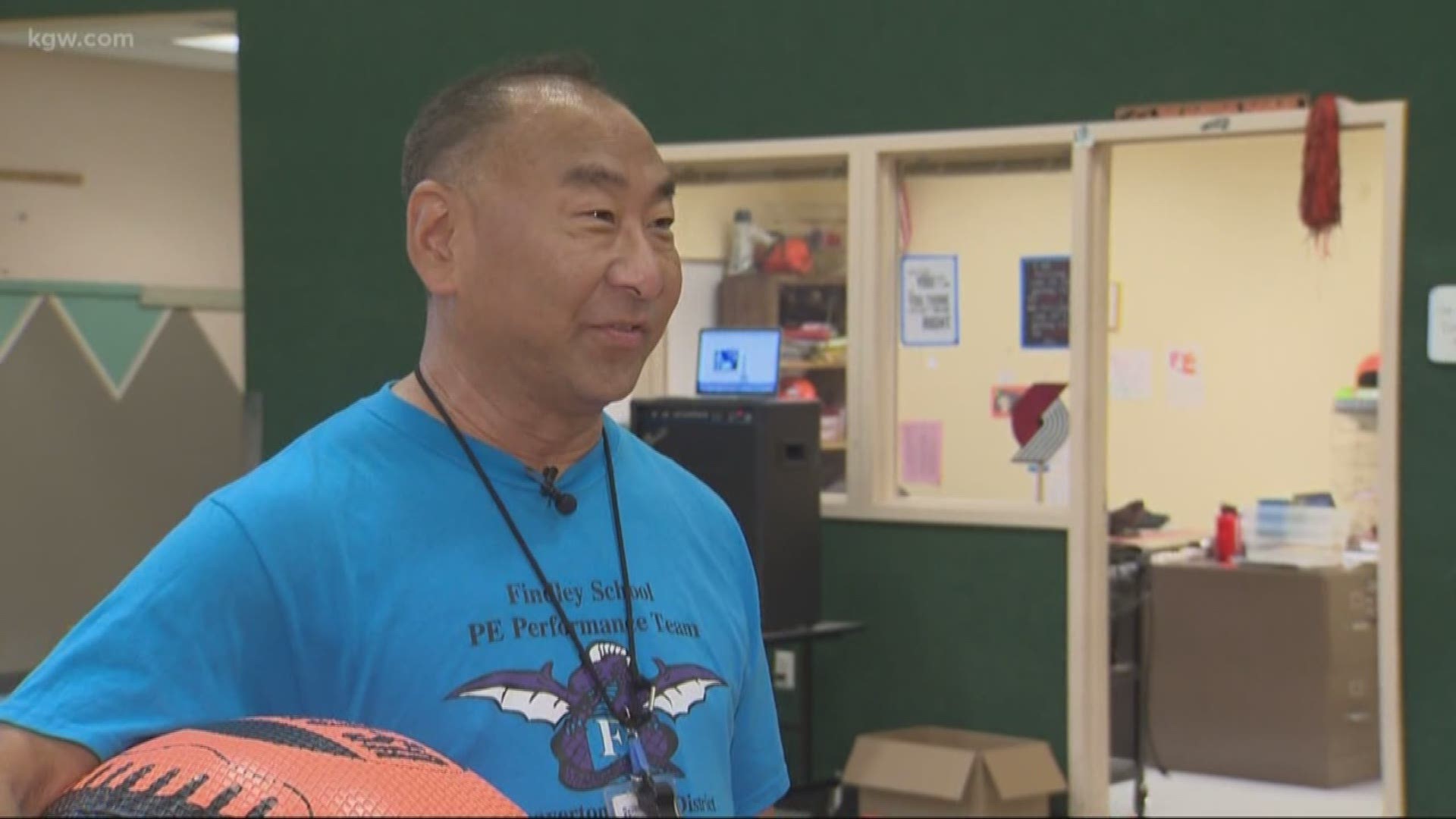 Jon Onishi, a PE teacher at Findley Elementary School chats with KGW Sunrise anchor Brenda Braxton about his enthusiasm for the job and students