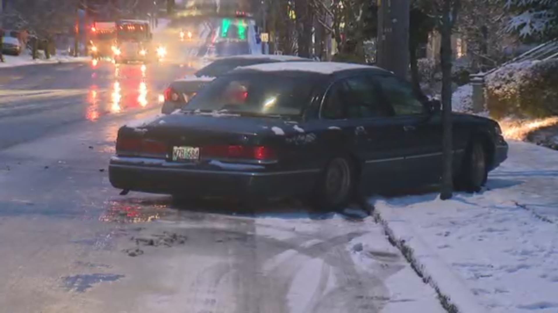 Nearly two dozen vehicles found themselves stuck Tuesday morning in a  trap of ice at Northeast 82nd Avenue and Killingsworth Street.