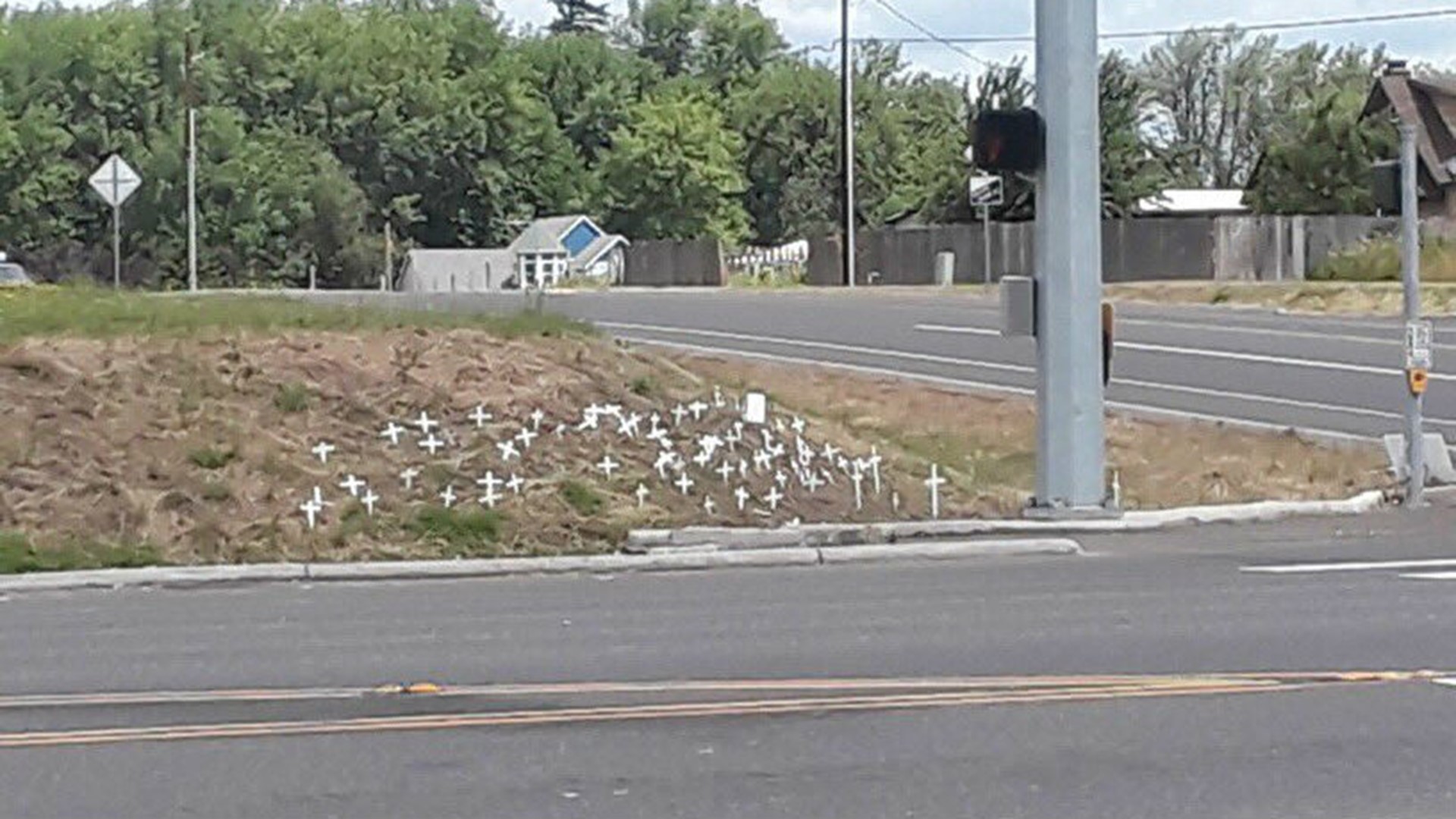 Crosses mark scene of chicken truck crash in Clark County | kgw.com