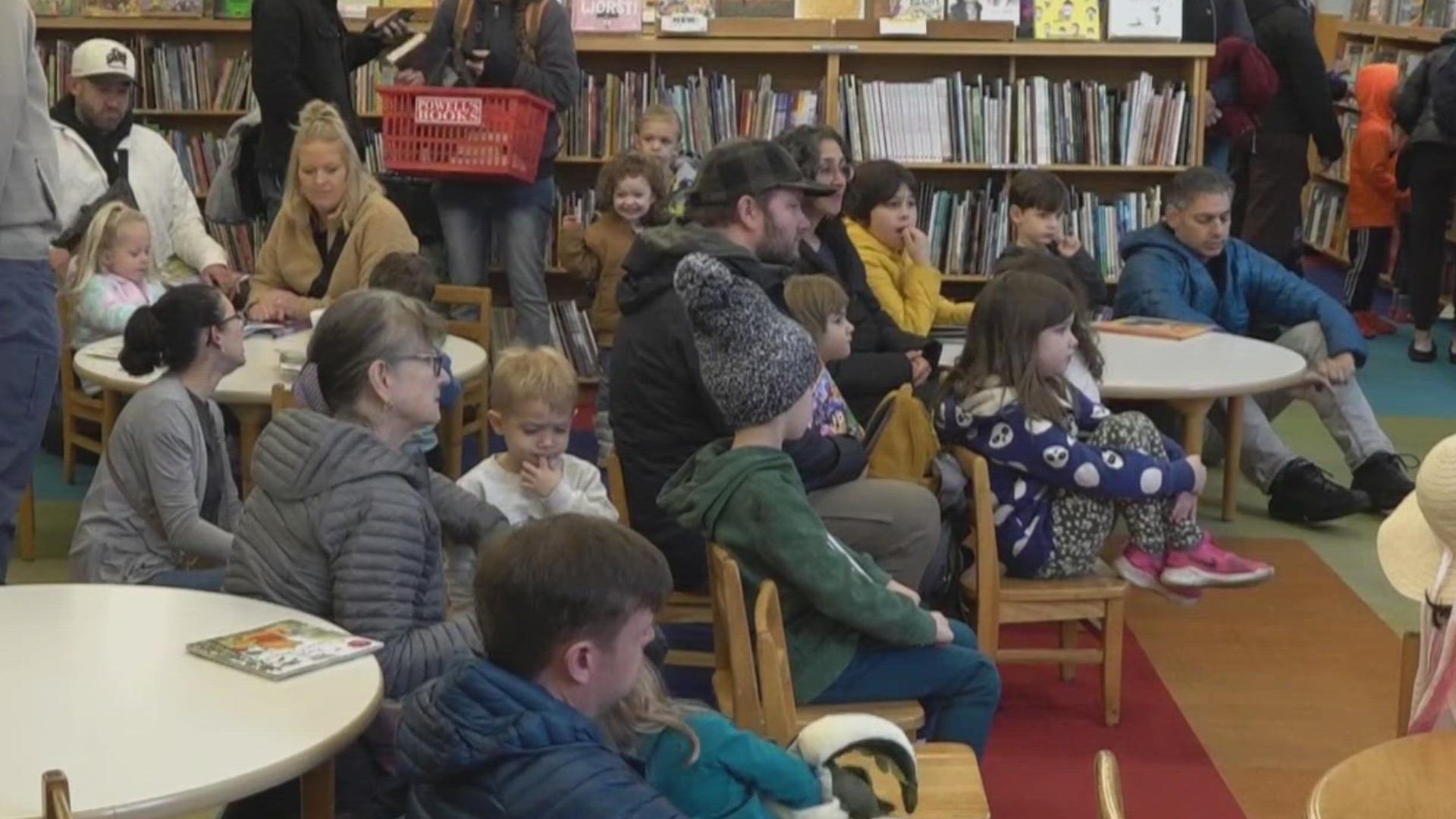 "Toby Finds a Home" was read to kids who had a chance to pick up signed copies and write notes for care kits for those receiving services at Blanchet House.