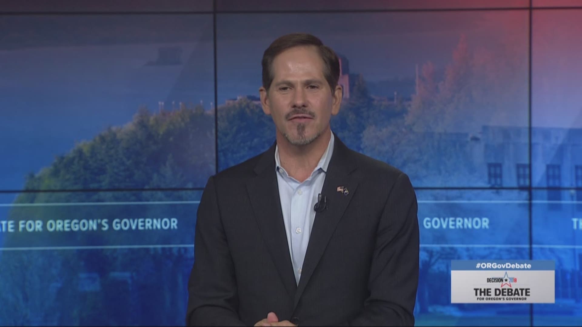 Gov. Brown and Rep. Buehler discuss vaccinations during a debate on KGW on Oct. 9, 2018.